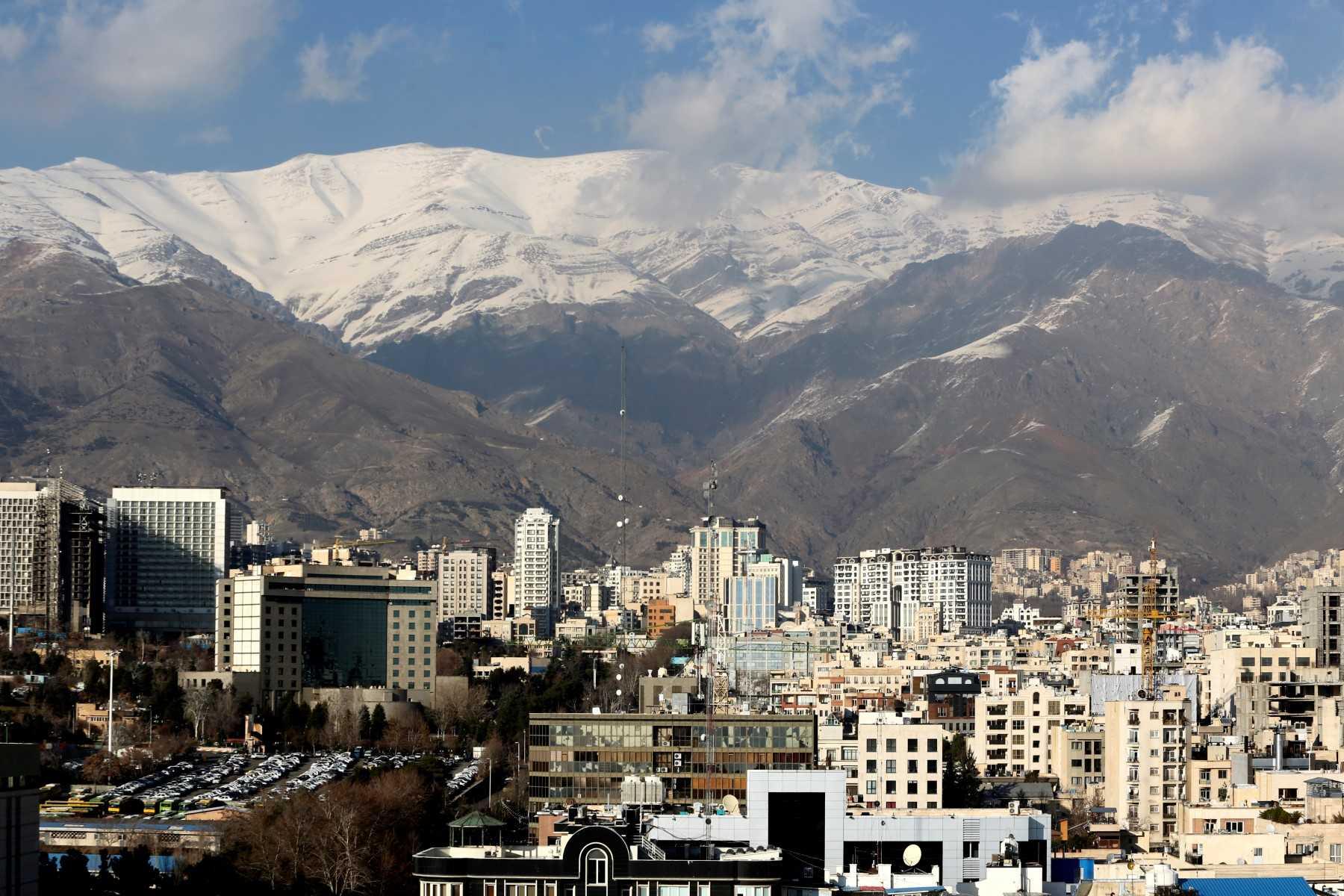 A general view shows the Iranian capital Tehran with the snow-covered Alborz mountain range in the background on Jan 7. Photo: AFP