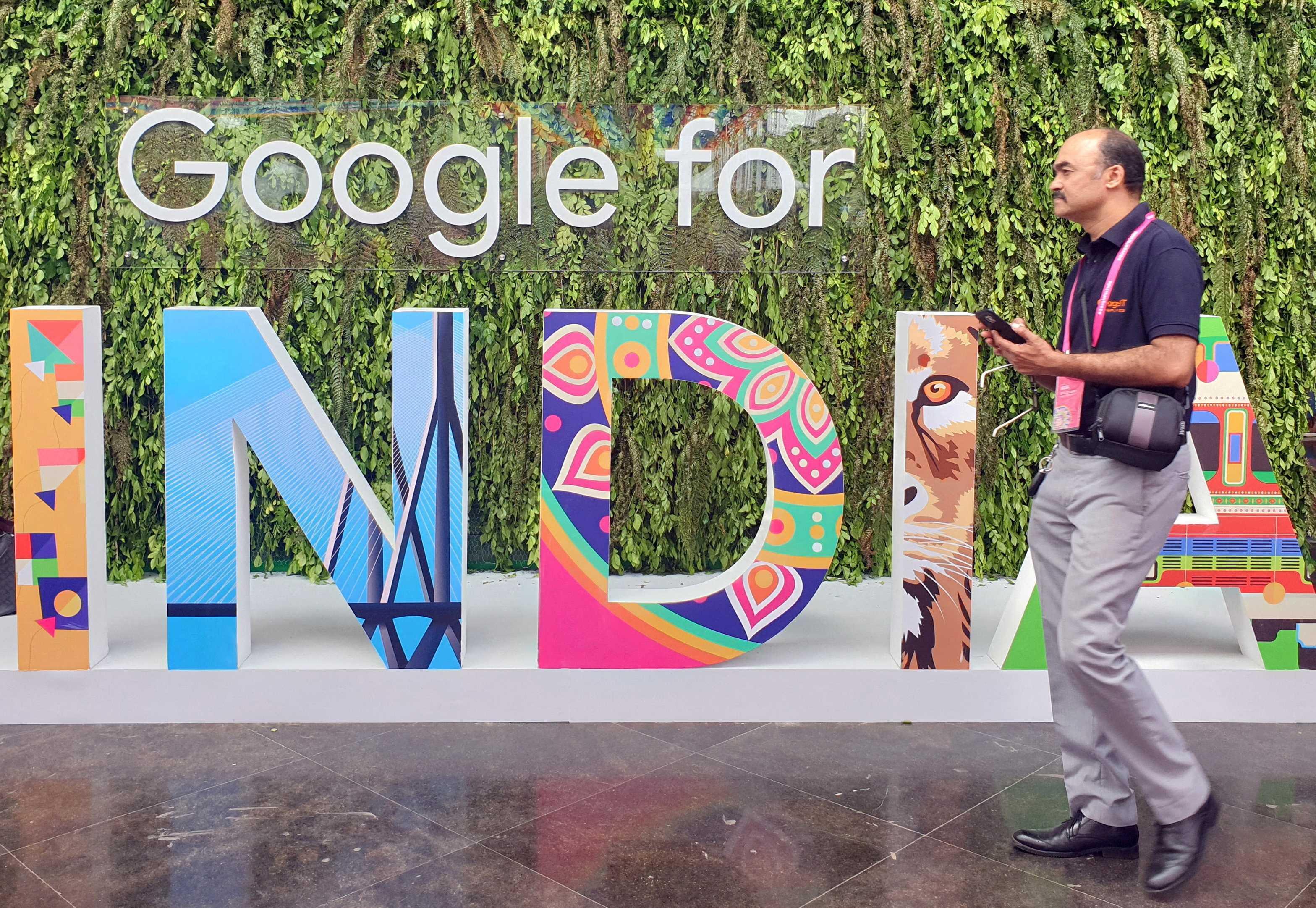 A man walks past the sign of 'Google for India', the company's annual technology event in New Delhi, India, Sept 19, 2019. Photo: Reuters