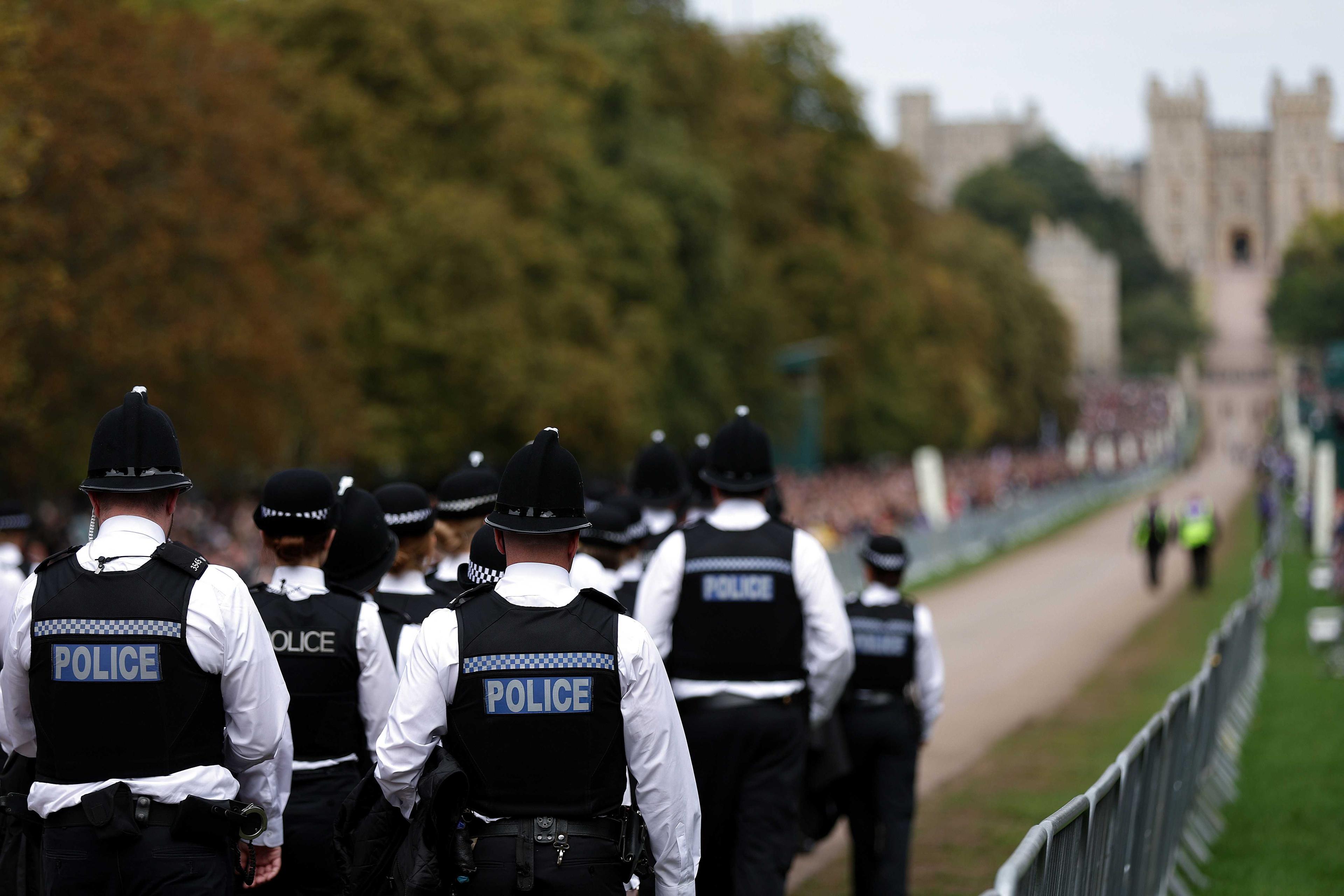 Members of the Police walk on Sept 19, 2022 in Windsor, England. Photo: Reuters 