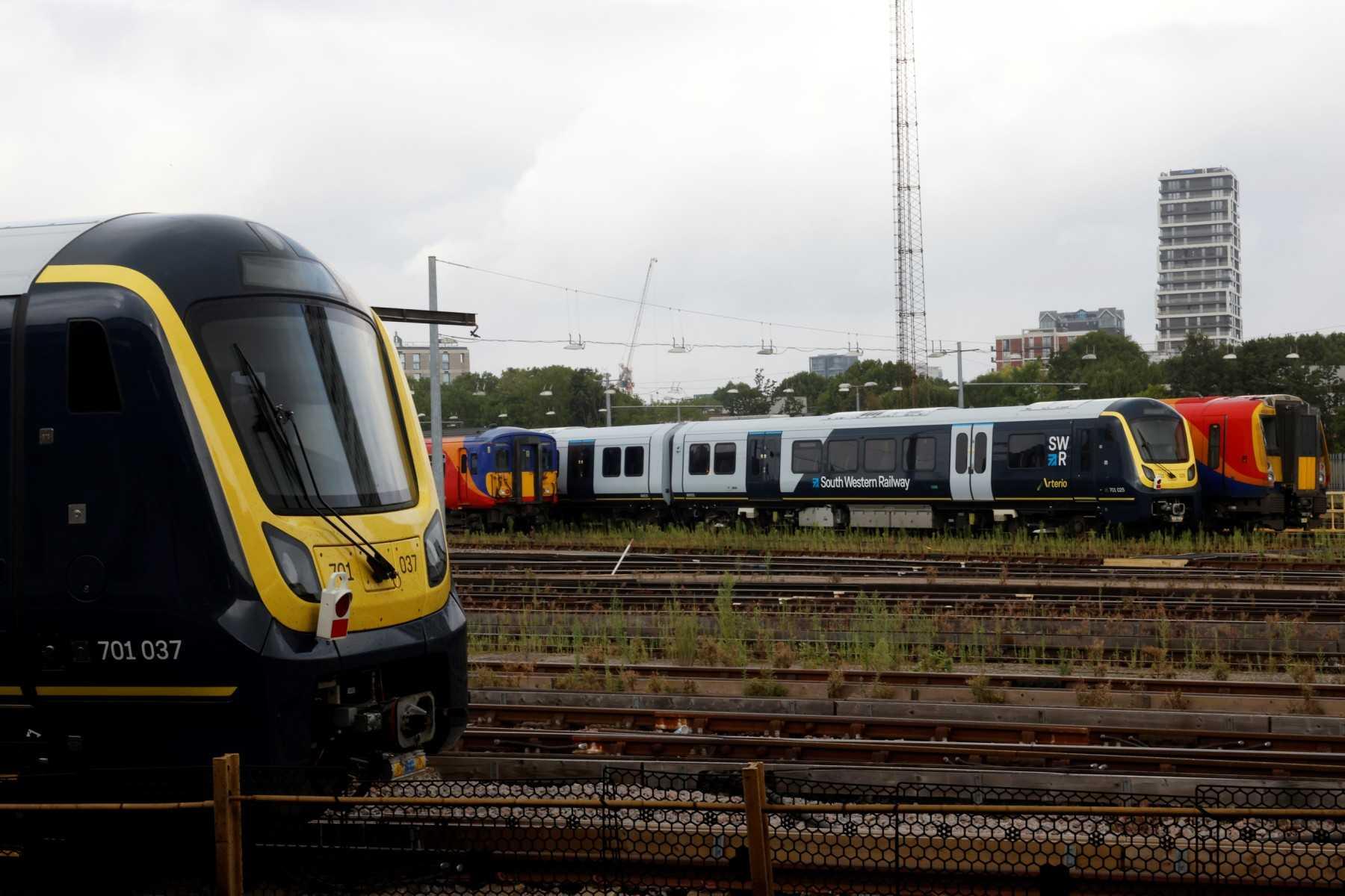 Trains are seen at Clapham Junction in London on Aug 18, 2022. Photo: AFP 