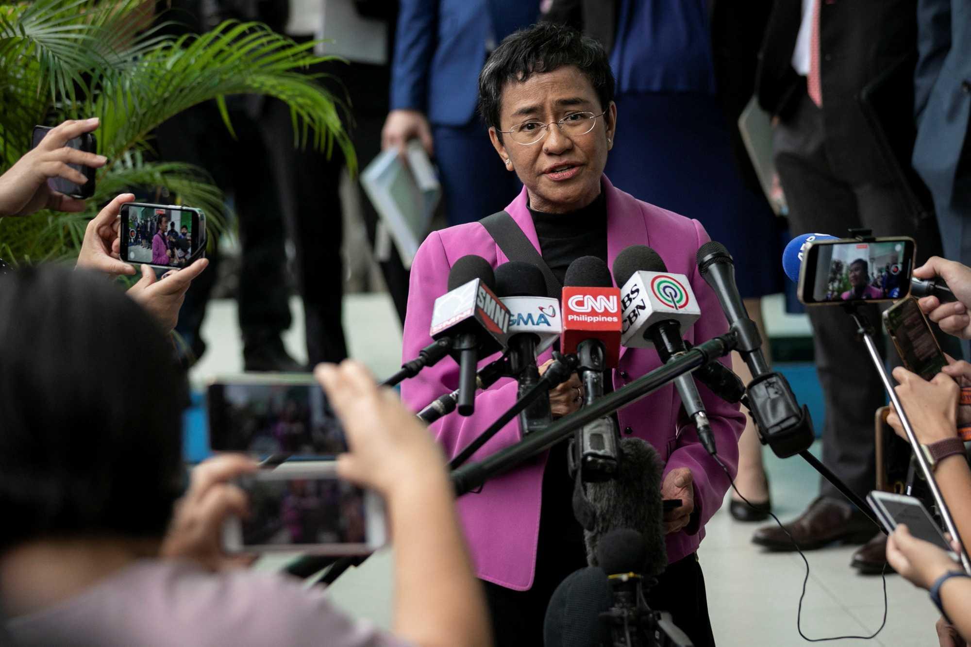Rappler CEO and Nobel Laureate Maria Ressa speaks to the press after a Manila court acquitted her from a tax evasion case, outside the Court of Tax Appeals in Quezon City, Philippines, Jan 18. Photo: Reuters