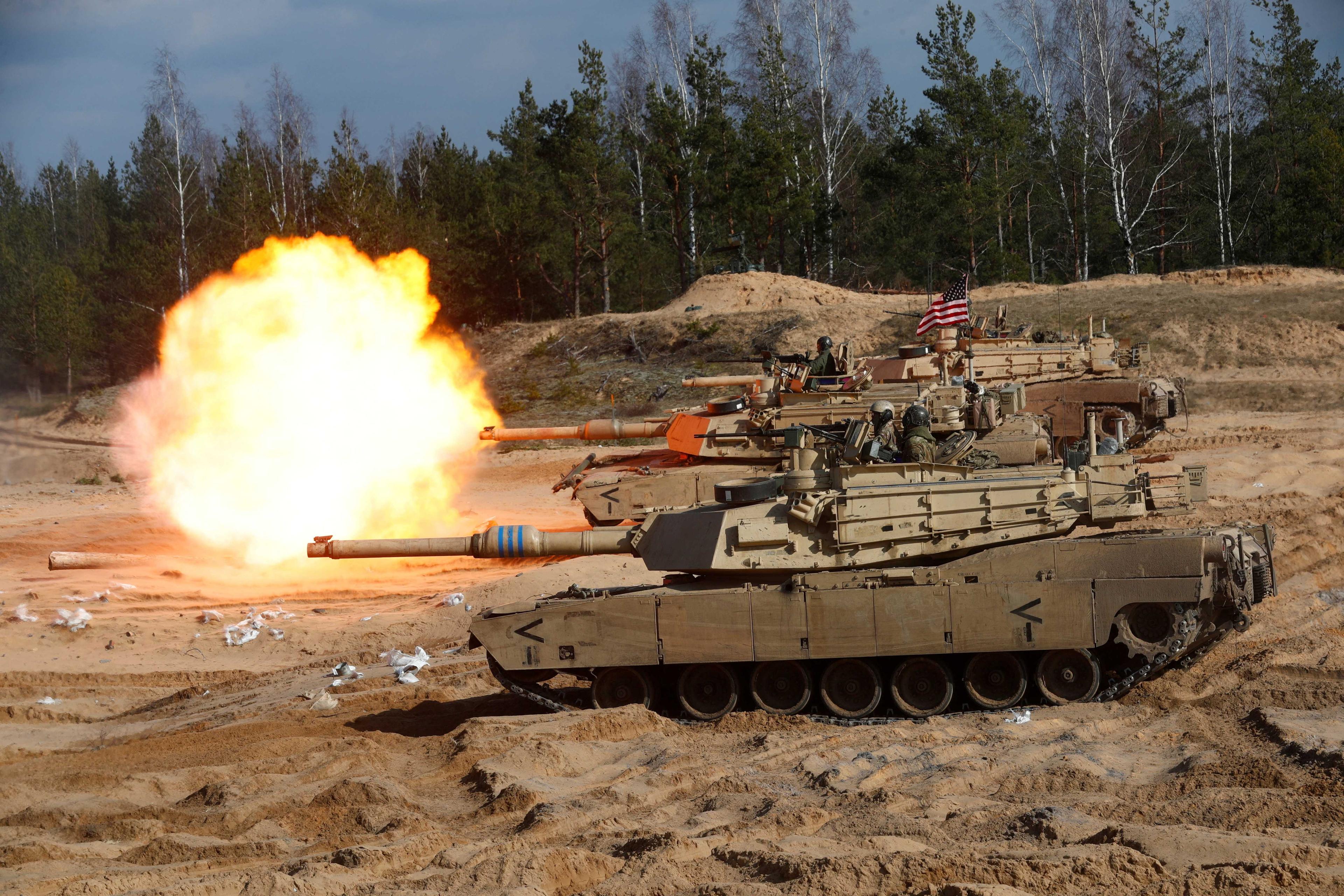 US Army M1A1 Abrams tank fires during Nato enhanced Forward Presence battle group military exercise Crystal Arrow 2021 in Adazi, Latvia March 26, 2021. Photo: Reuters