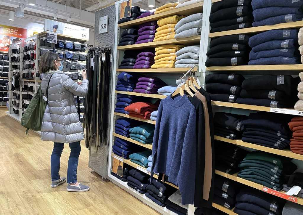 A customer looks at a display in a clothing store at Stonestown Galleria on Dec 15, 2022 in San Francisco, California. Photo: AFP