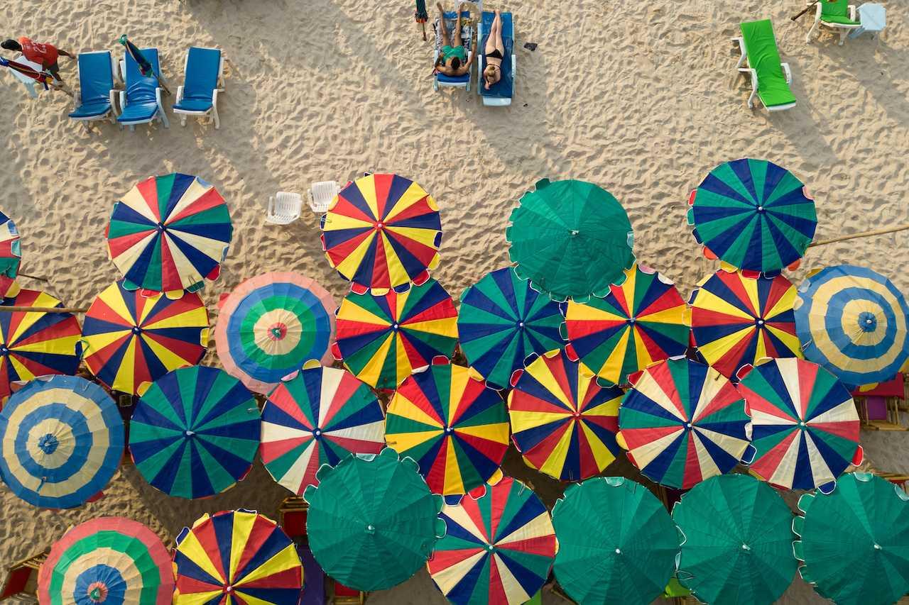 Colourful umbrellas are seen at a restaurant as tourists enjoy a beach on the island of Phuket in Thailand, Jan 19. Photo: Reuters