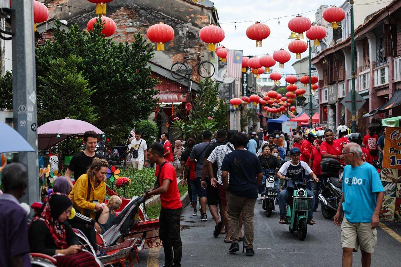Visitors fill Armenian Street in Georgetown, Penang, as the Chinese New Year celebration continues. Photo: Bernama 