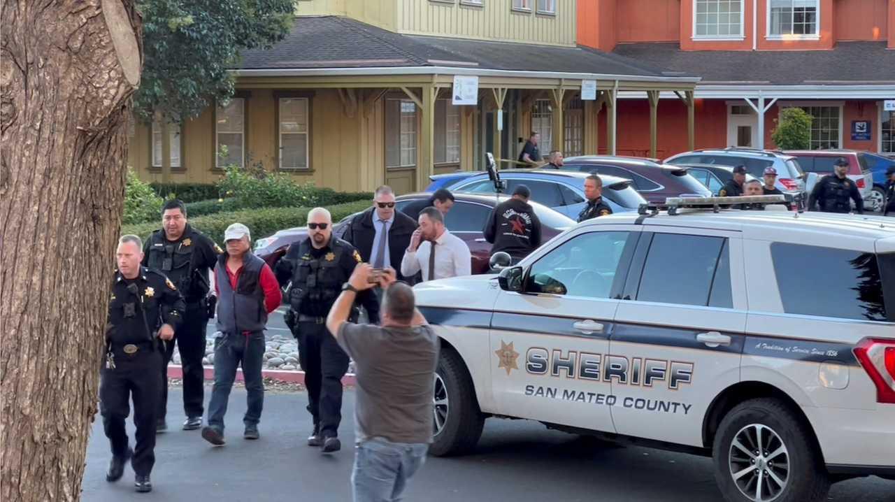 Police officers detain a man, believed by law enforcement to be the Half Moon Bay mass shooting suspect, in Half Moon Bay, California, Jan 23, in this screengrab taken from a social media video. Photo: Reuters