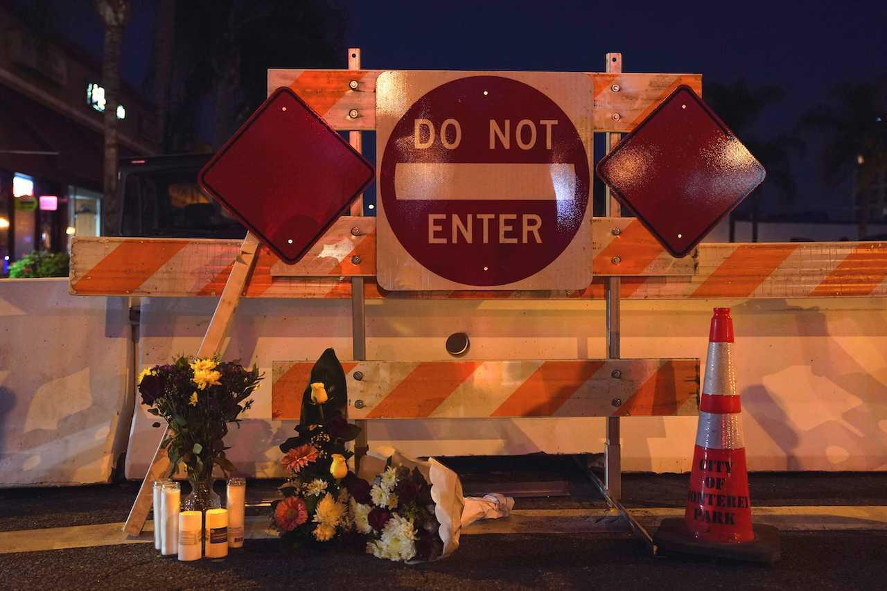 Flowers are left near the scene of a shooting that took place during a Chinese New Year celebration, in Monterey Park, California, Jan 22. Photo: Reuters