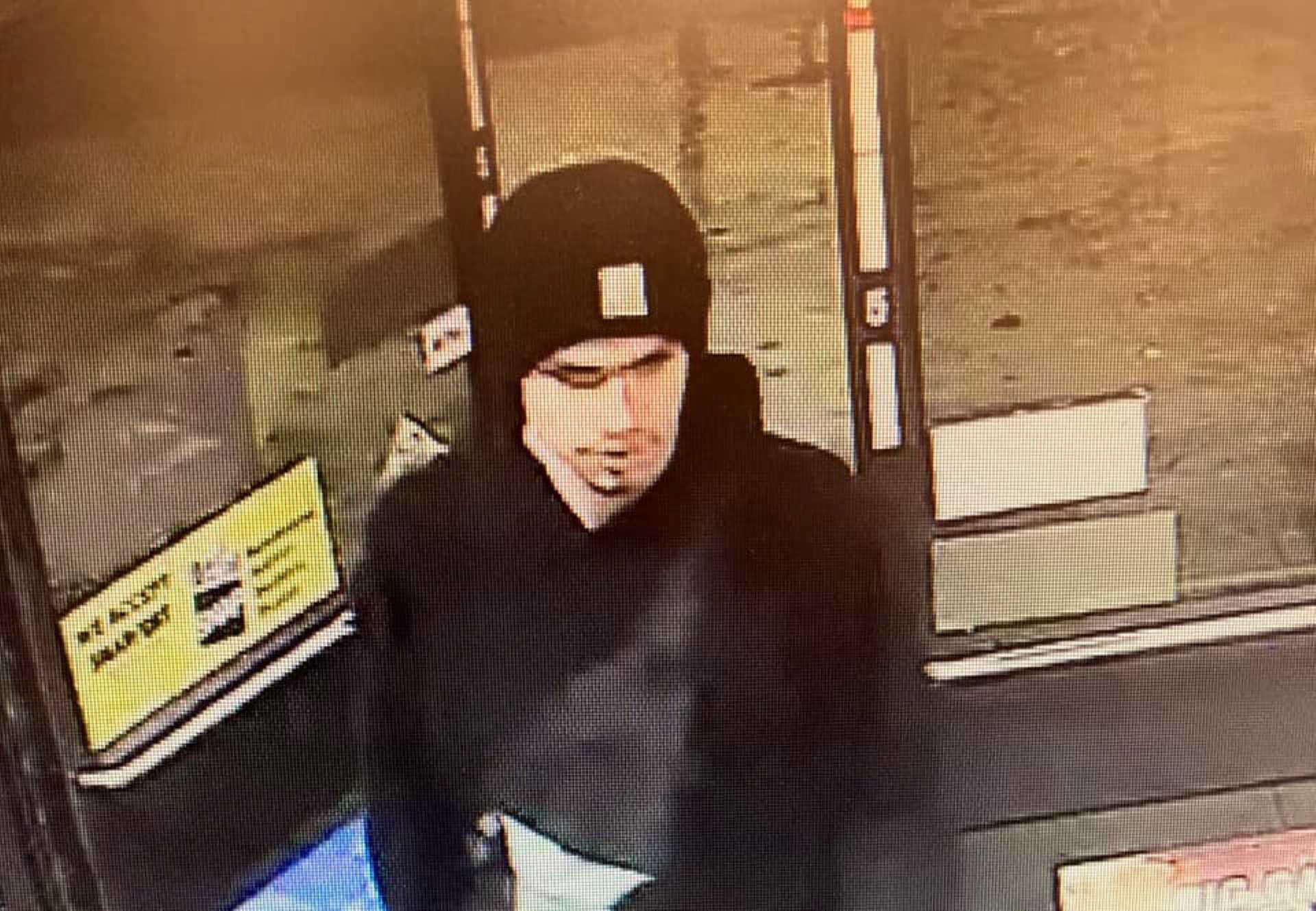 This surveillance camera image released by the Yakima Police Department in Washington state on Jan 24 reportedly shows the suspect sought by police in a shooting that left three people dead. Photo: AFP