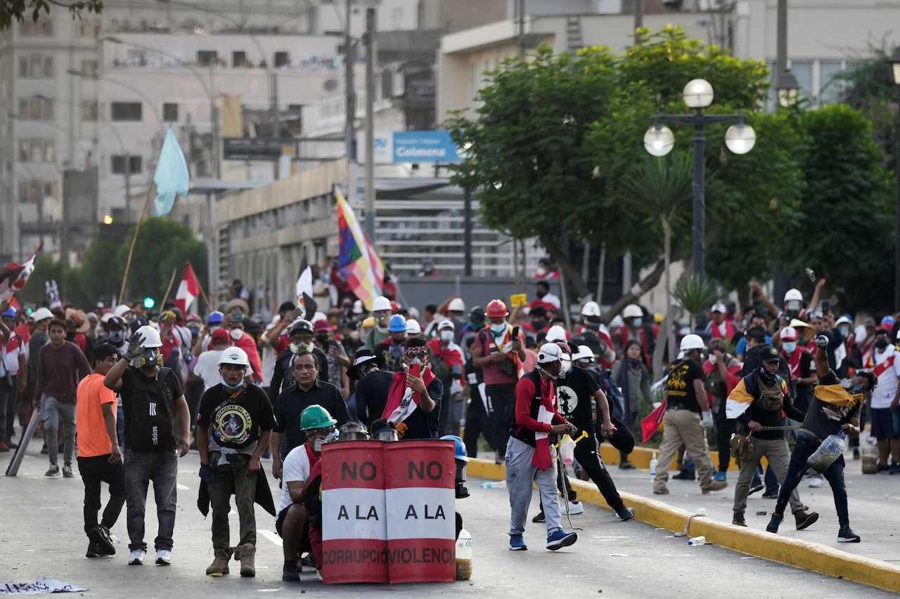 People take part in an anti-government demonstration following the ouster of Peru's former president Pedro Castillo, in Lima, Peru, Jan 24. Photo: Reuters