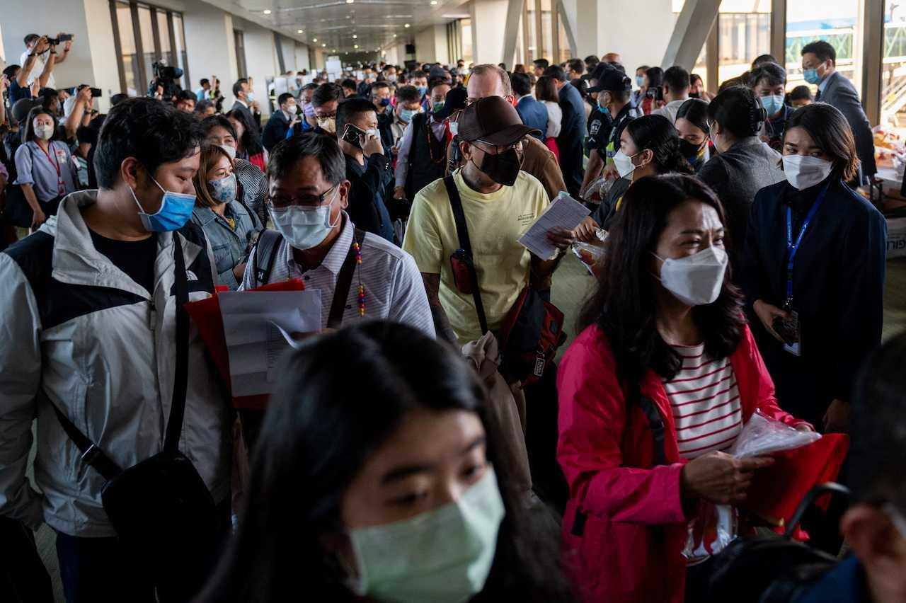 Travellers from China arrive at the Ninoy Aquino International Airport, in Pasay City, Metro Manila, Philippines, Jan 24. Photo: Reuters
