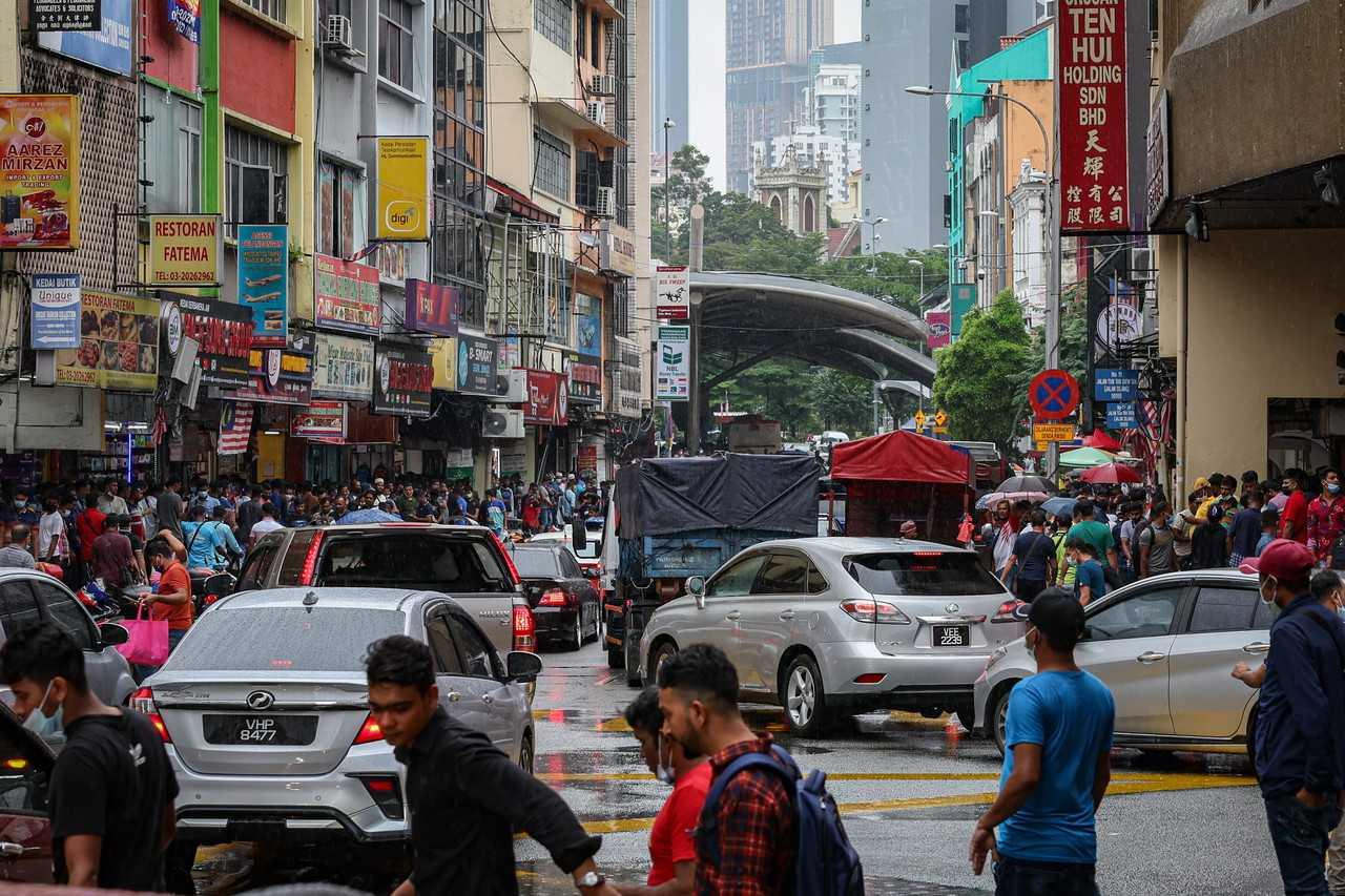 People make their way through Jalan Tun Tan Siew Sin and Jalan Silang in the capital city of Kuala Lumpur. Photo: Bernama