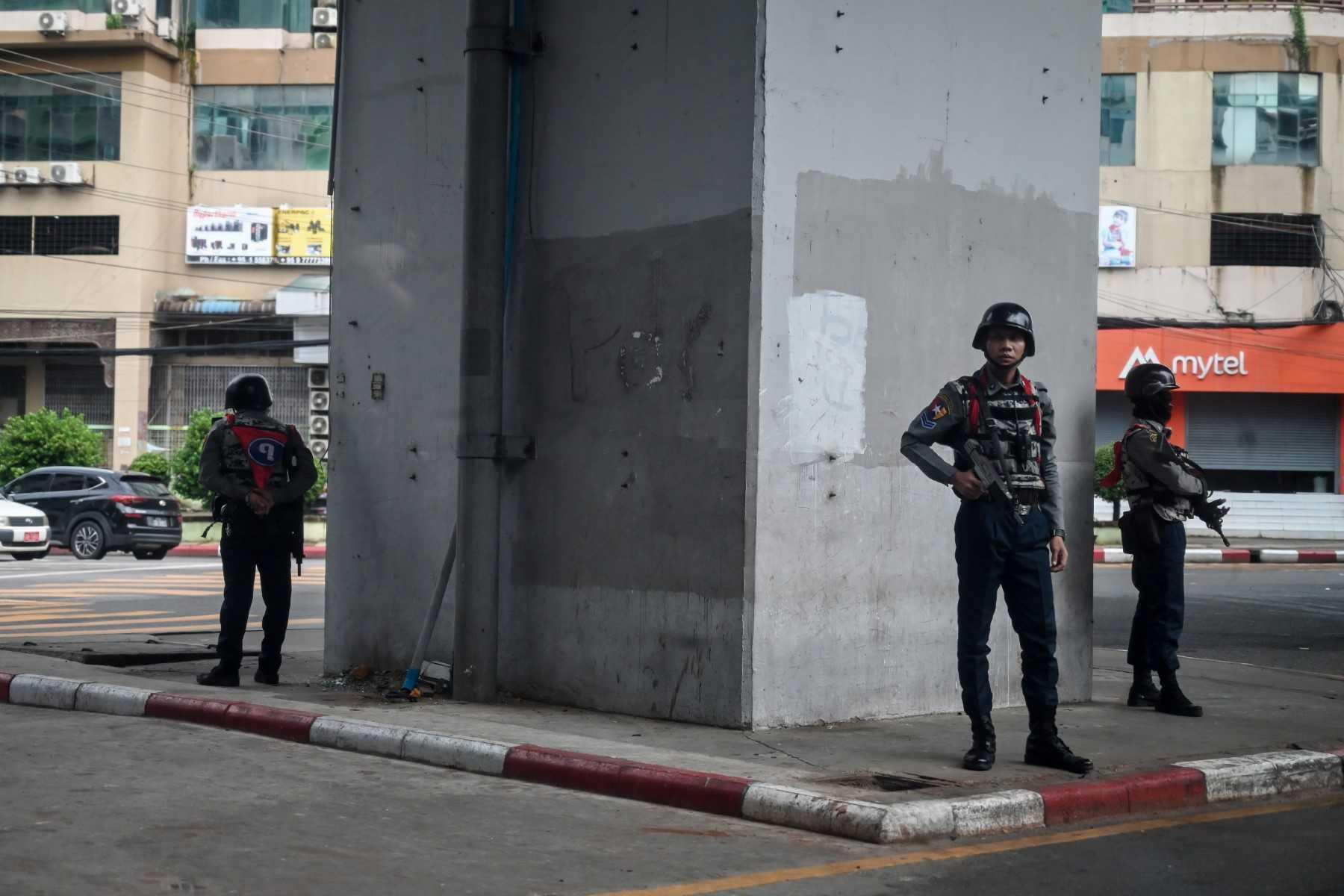 Members of the Myanmar security forces stand guard on a street in Yangon on July 19, 2021. Photo: AFP
