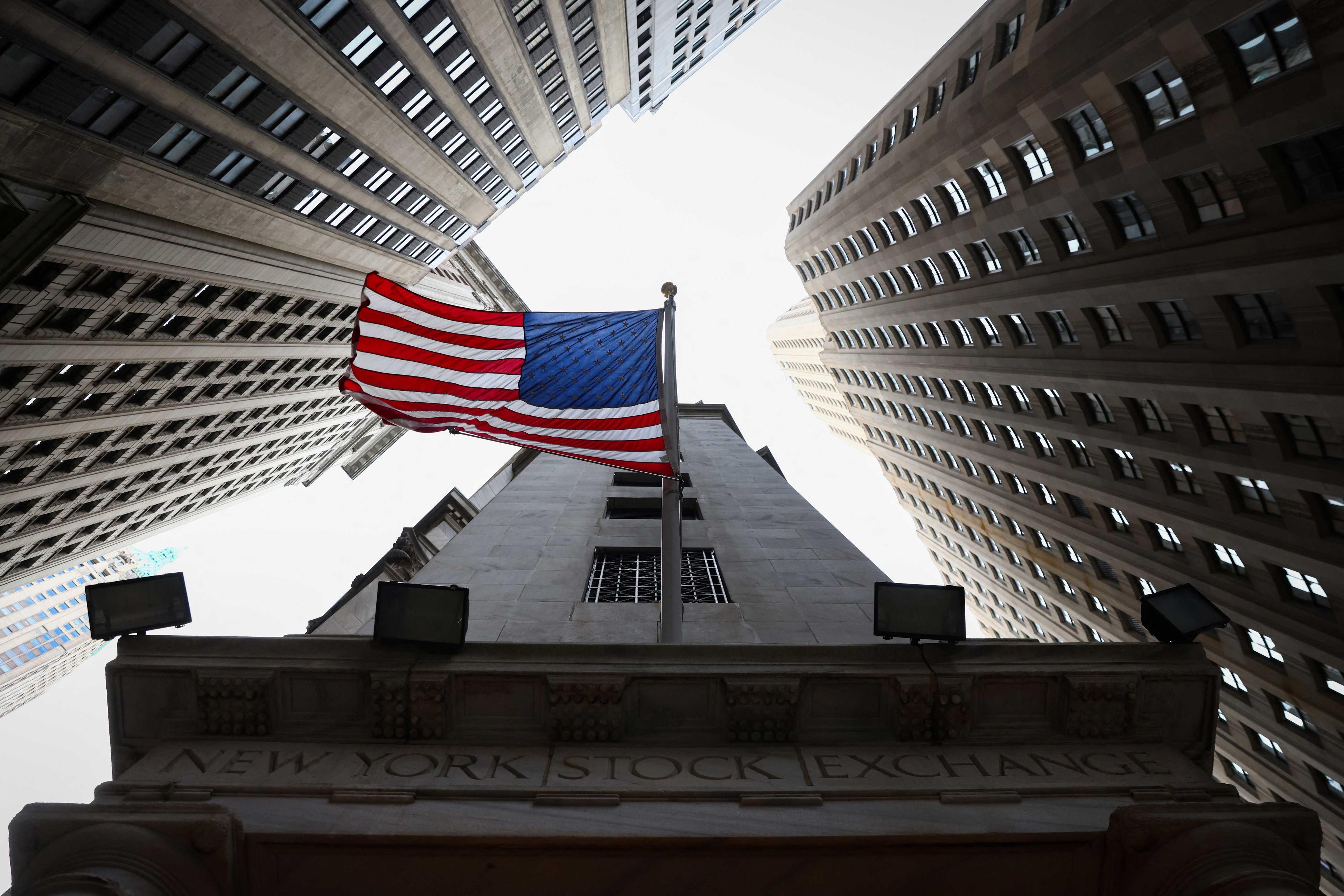 A US flag is seen outside the New York Stock Exchange (NYSE) in New York City, US, Jan 26. Photo: Reuters