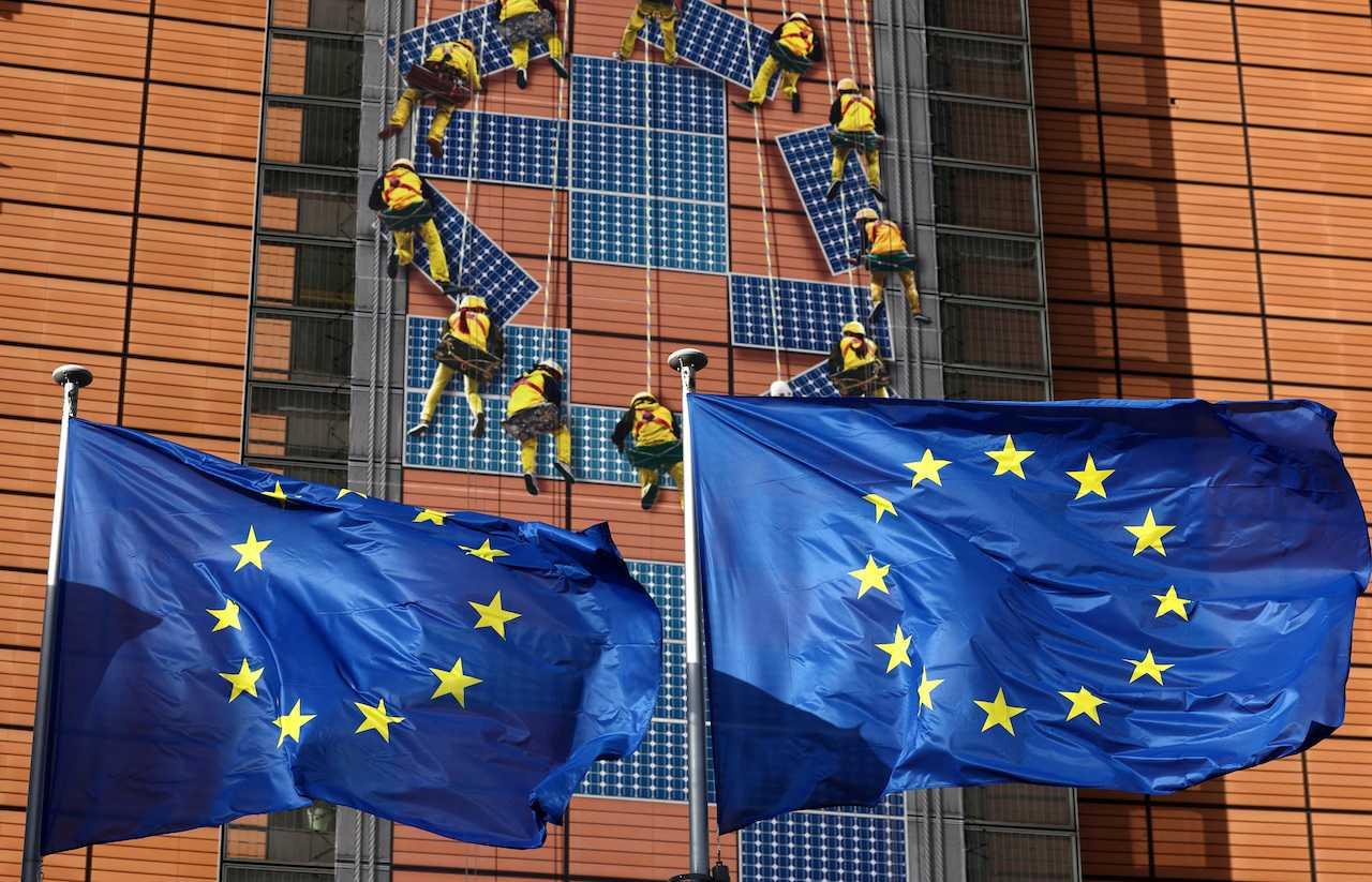 European Union flags flutter outside the EU Commission headquarters, in Brussels, Belgium, Feb 1. Photo: Reuters