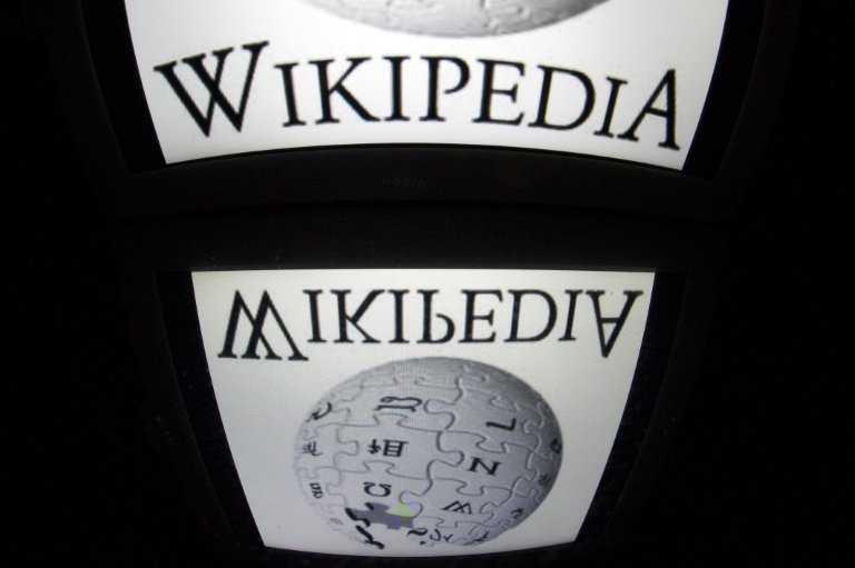 The Wikipedia logo is seen on a tablet screen on December 4, 2012 in Paris. Photo: AFP 