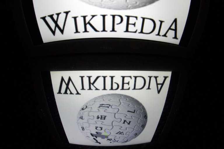 The Wikipedia logo is seen on a tablet screen on December 4, 2012 in Paris. Photo: AFP