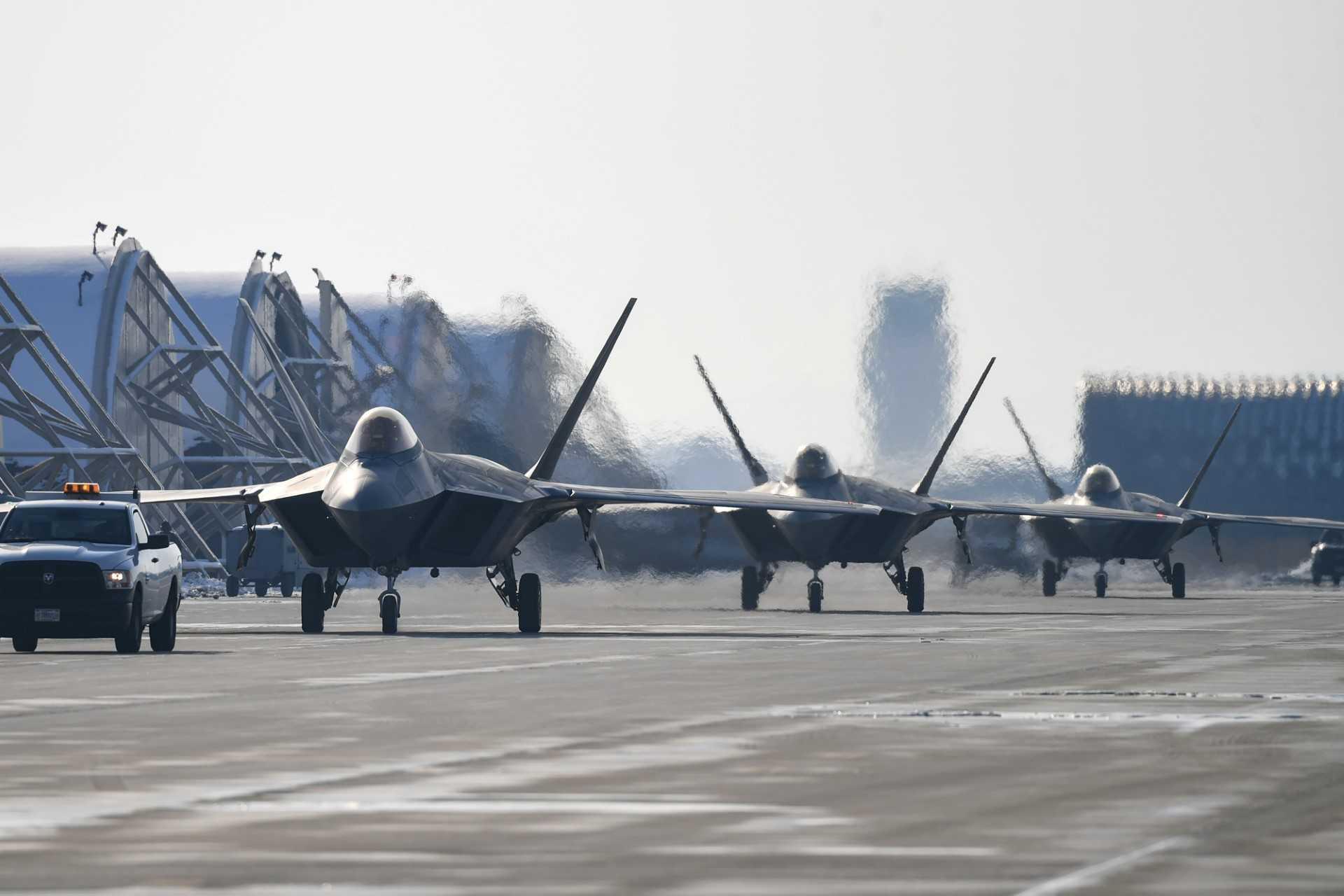This handout photo taken on Dec 20, 2022 and provided by South Korean Defence Ministry in Seoul shows US Air Force F-22 fighter jets at Gunsan Air Base in Gunsan. Photo: AFP 
