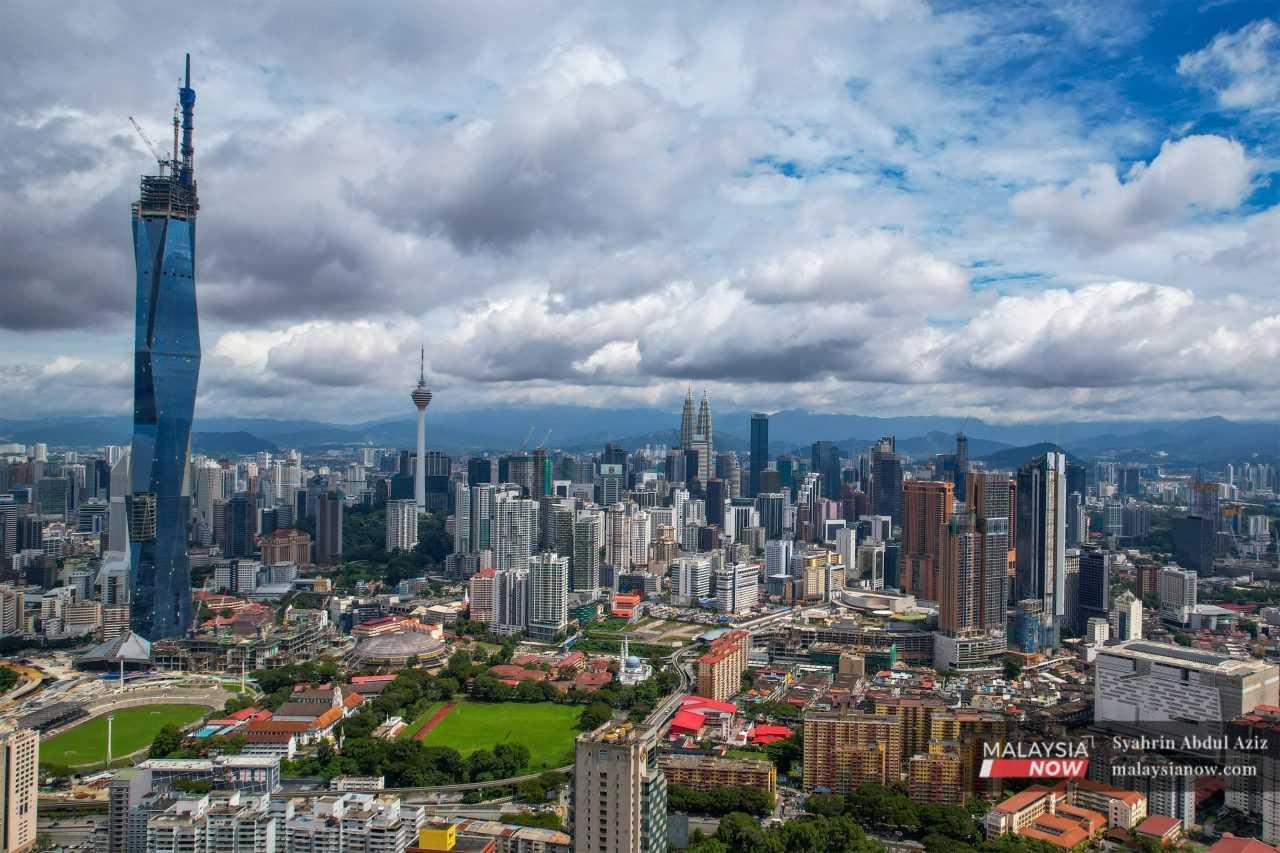 Buildings including the iconic Twin Towers and Menara KL tower in the capital city of Kuala Lumpur.