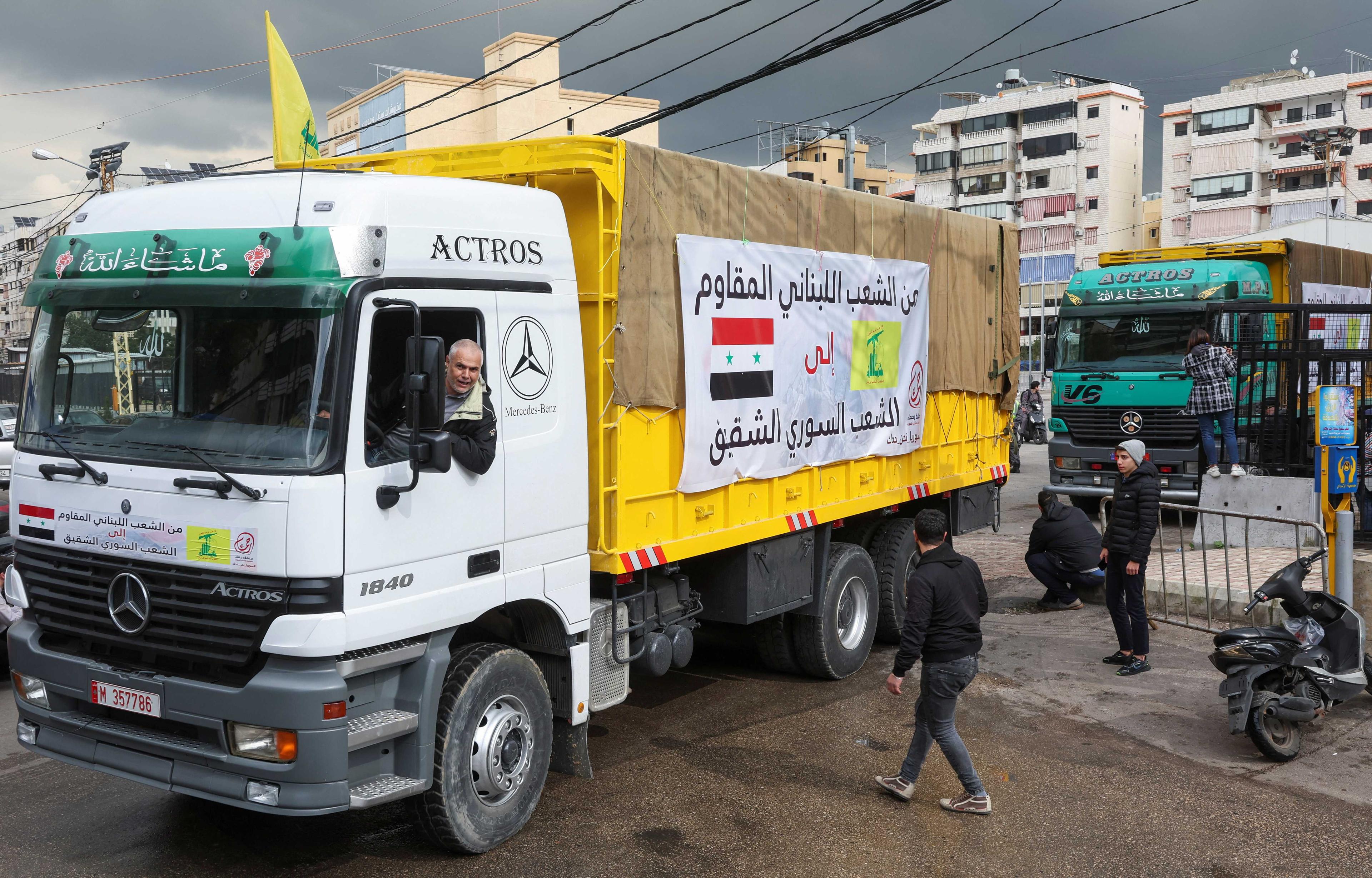 Seorang lelaki memandu lori yang sarat dengan bantuan kemanusiaan daripada Hizbullah ke Syria yang dilanda gempa bumi, di pinggir bandar Beirut, Lubnan 12 Februari. Gambar: Reuters