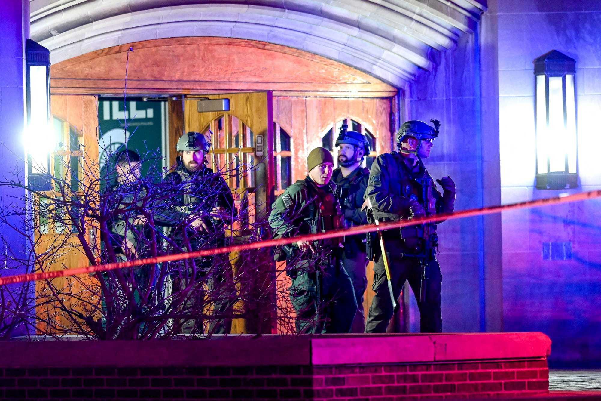 Police walk around Berkey Hall after a shooting on the Michigan State campus in East Lansing, Michigan, US, Feb 14. Photo: Reuters