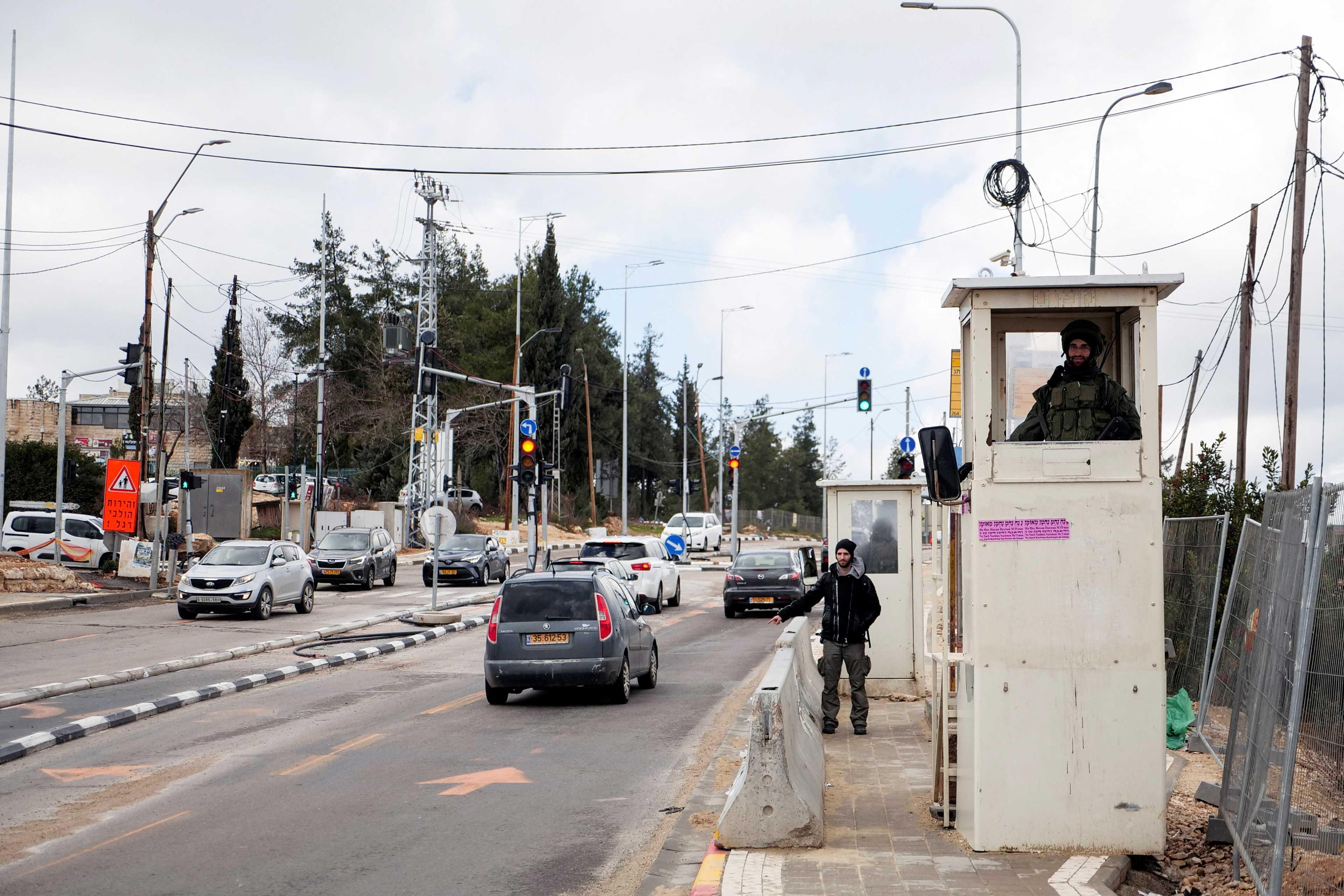 Soldiers stand guard at Gush Etzion Junction in the Gush Etzion settlements compound, in the Israeli-occupied West Bank Feb 2. Photo: Reuters