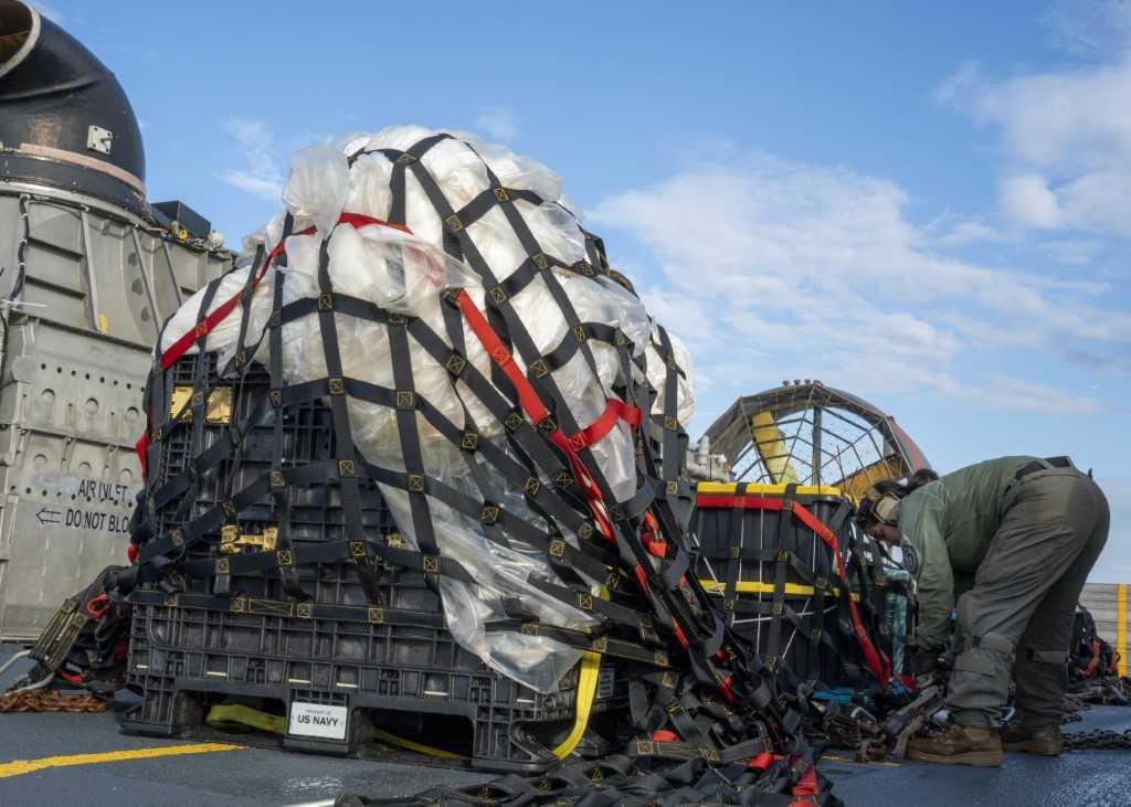 In this US Navy handout, Sailors assigned to Assault Craft Unit 4 prepare material recovered in the Atlantic Ocean from a high-altitude balloon for transport to federal agents at Joint Expeditionary Base Little Creek Feb 10. Photo: AFP 
