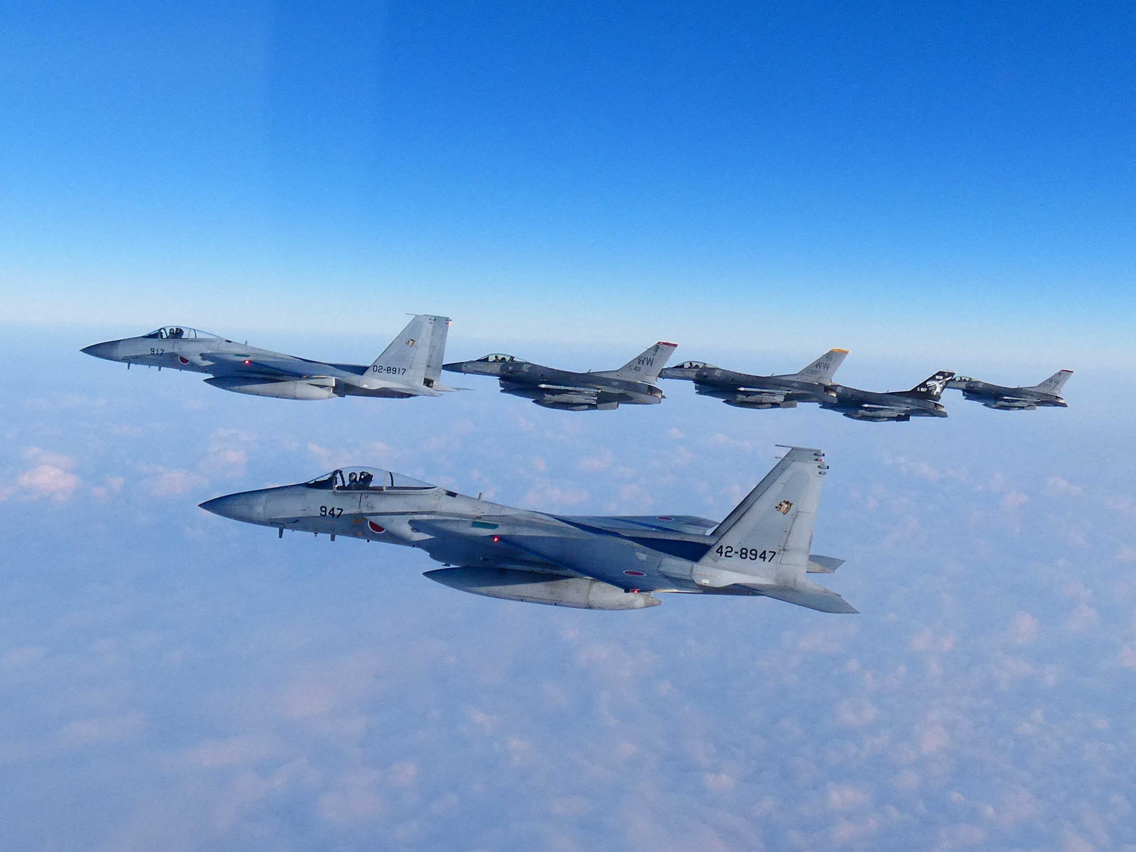 The 2nd Air Wing of Japan Air Self-Defense Force's F-15s fighters hold a joint military drill with the US F-16s fighters at Sea of Japan, in this handout picture taken by Japan Air Self-Defence Force and released by the Joint Staff Office of the Defense Ministry of Japan Feb 19. Photo: Reuters