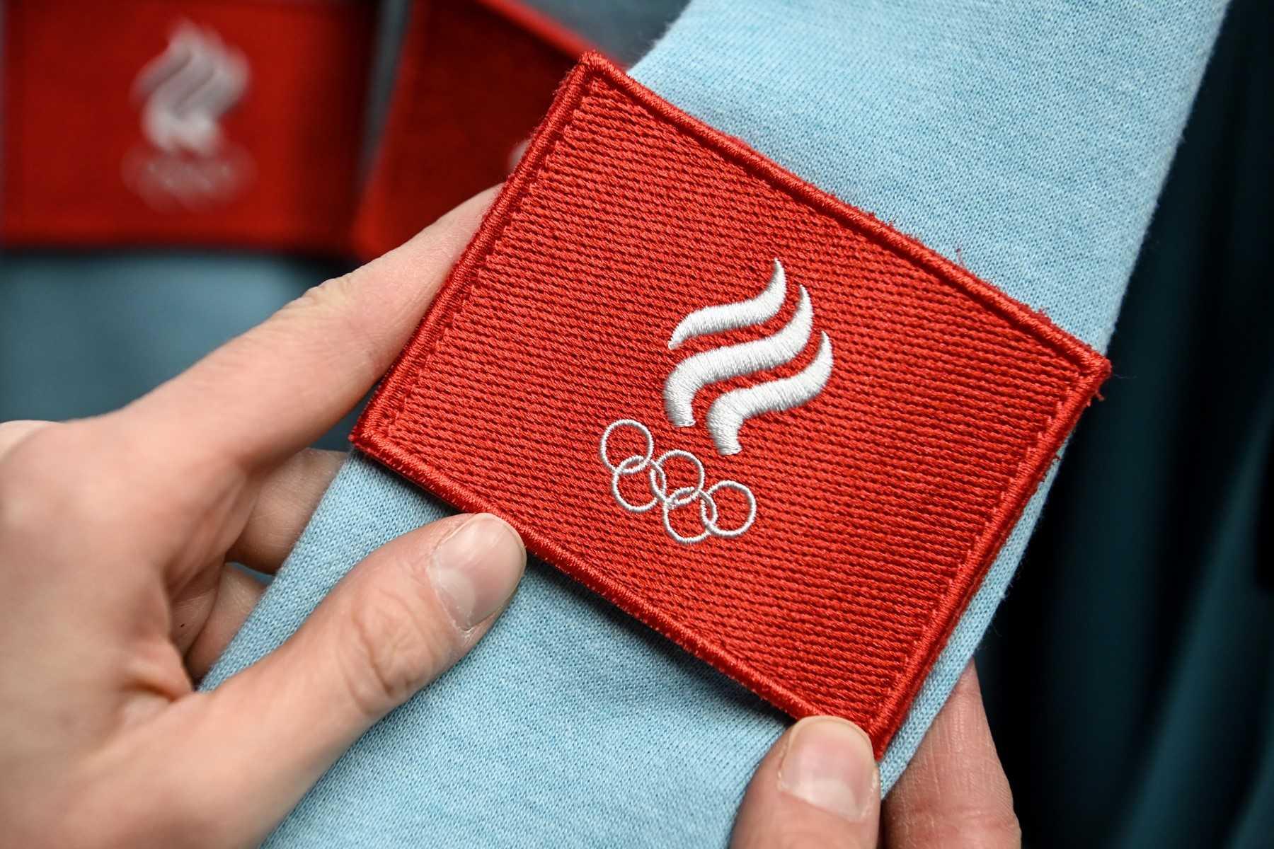 A patch with the Russian Olympic team emblem is pictured during the opening of an equipment centre for athletes and delegation members going to the Beijing 2022 Winter Olympic Games in Moscow on Jan 14, 2022. Photo: AFP