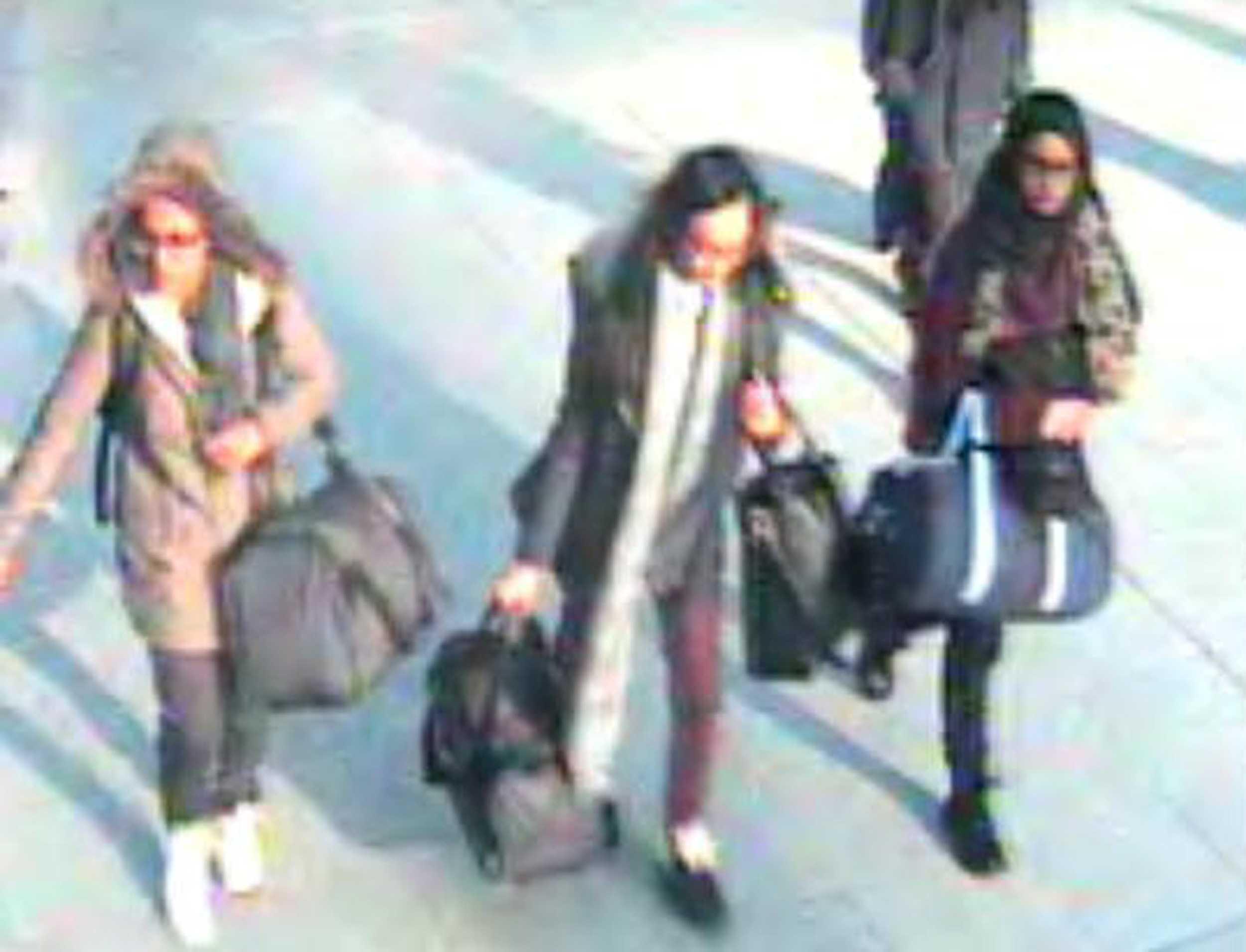 A handout CCTV picture received from the Metropolitan Police Service on Feb 23, 2015 shows (left to right) British teenagers Amira Abase, Kadiza Sultana and Shamima Begum walking with luggage at Gatwick Airport, south of London, on Feb 17, 2015. Photo: AFP