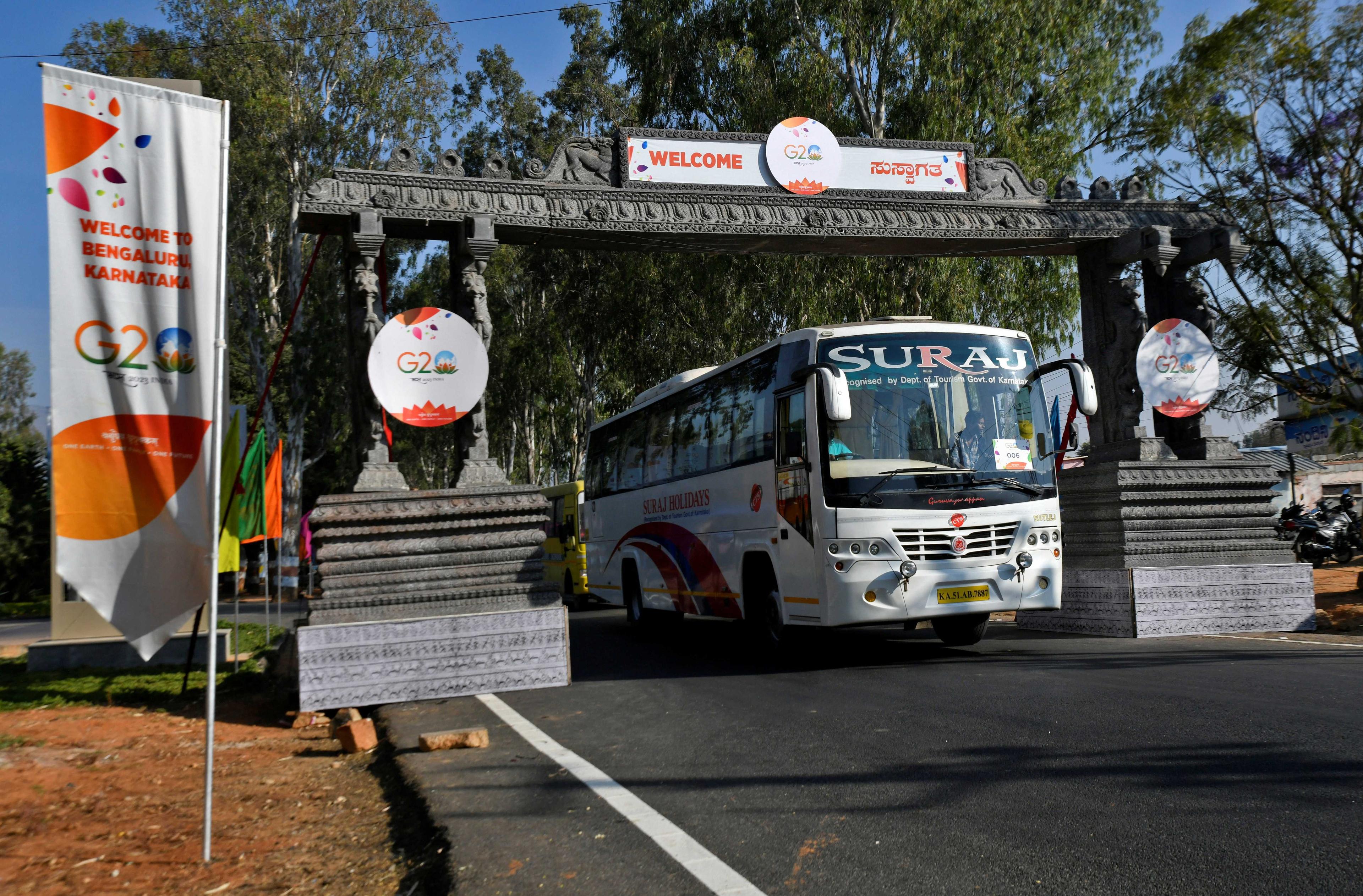 A bus carrying delegates arrives at G20 finance officials meeting venue near Bengaluru, India, Feb 22. Photo: Reuters