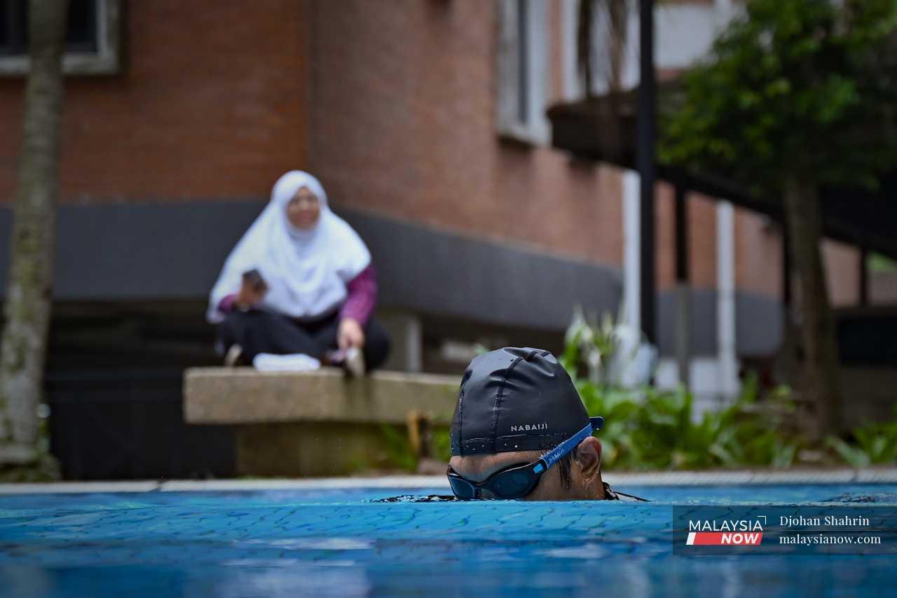 Even outdoor activities such as swimming are not out of the question for Razlan. 