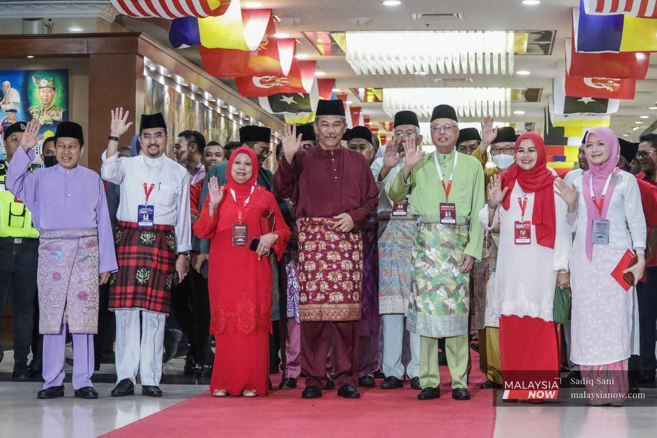 Umno vice-president Ismail Sabri Yaakob (third from right) with other party leaders including deputy president Mohamad Hasan (centre) and secretary-general Ahmad Maslan (left) at the 2022 general assembly in Kuala Lumpur, Jan 11. 