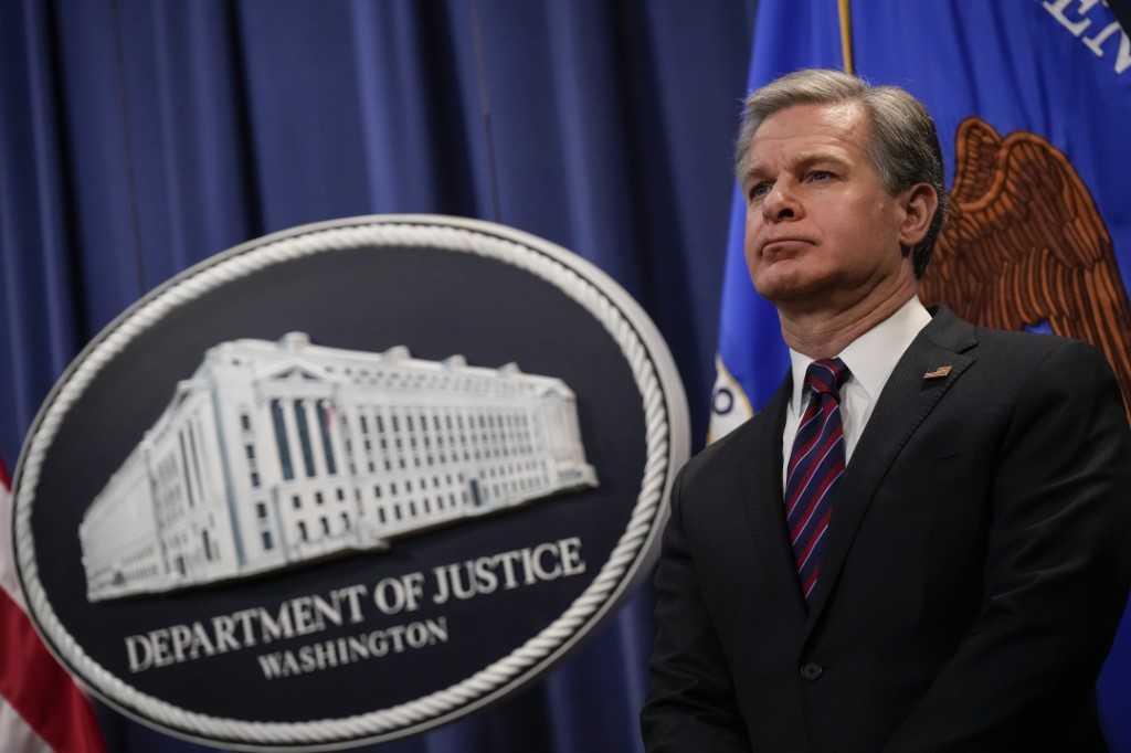 Pengarah FBI Christopher Wray menghadiri sidang akhbar pada 27 Januari, di Washington. Gambar: AFP
