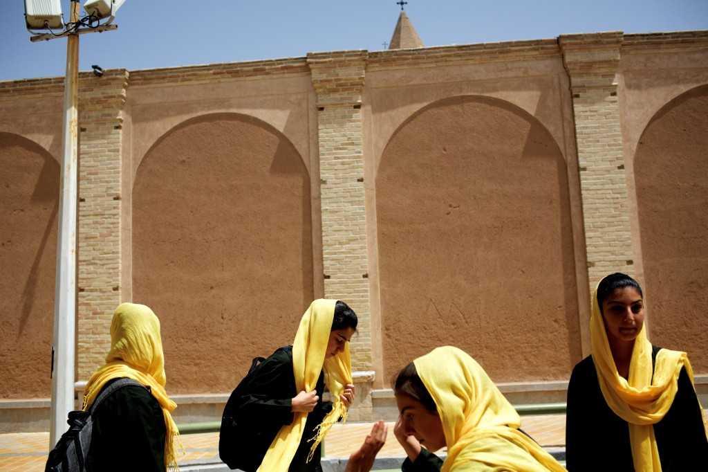 Iranian Armenian schoolgirls walk home after class in the Julfa neighbourhood, some 400km south of the capital, Tehran on April 21, 2015. Photo: AFP