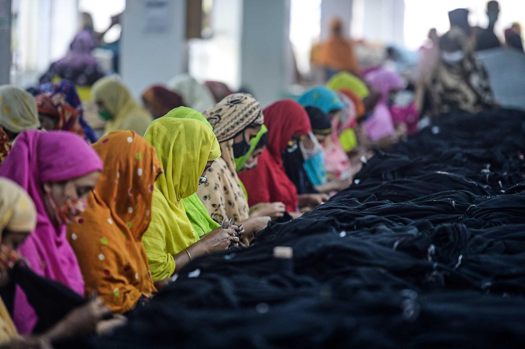 Women work in a garment factory in Gazipur, some 35km from Dhaka on Feb 15, 2021. Photo: AFP