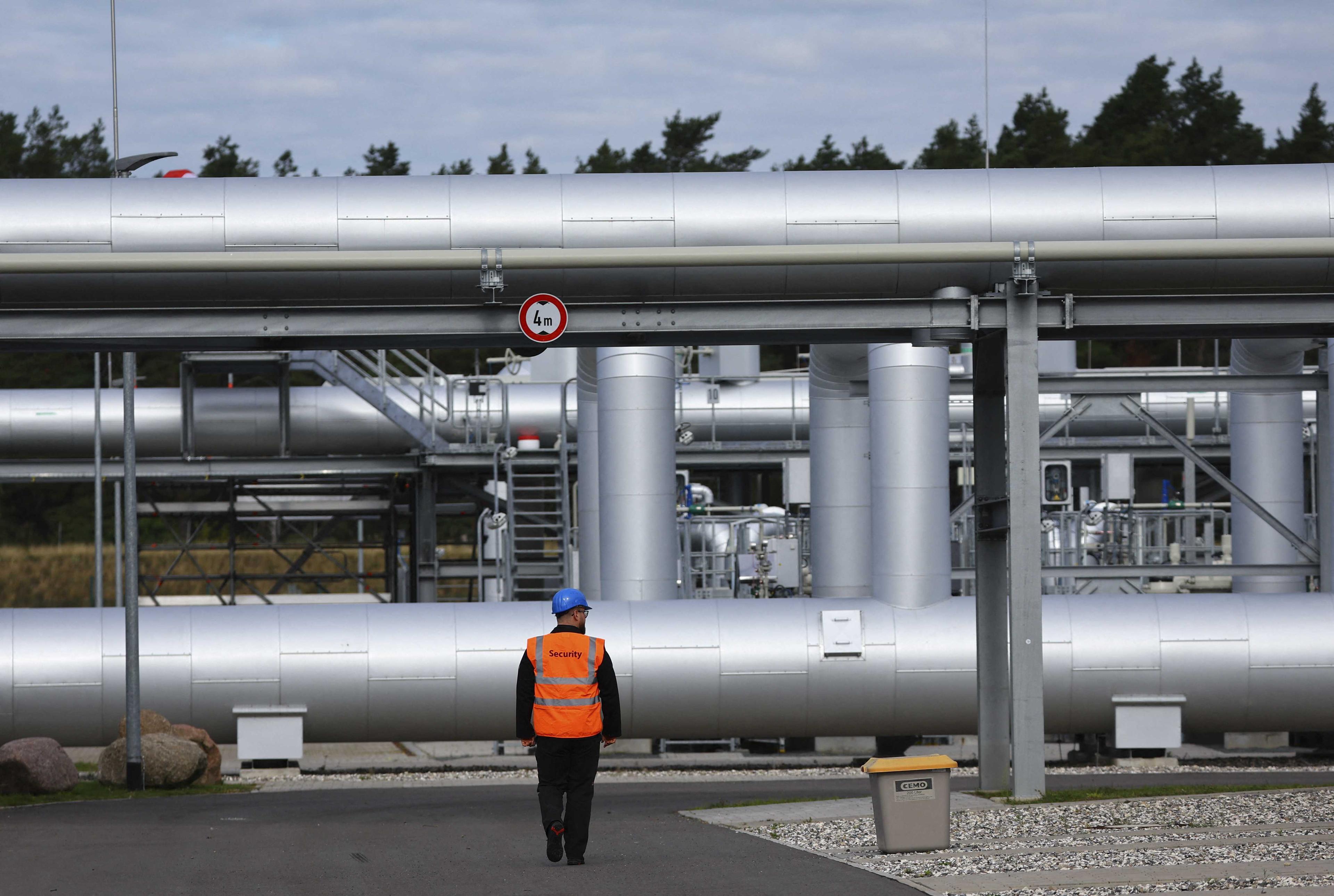 Security walks in front of the landfall facility of the Baltic Sea gas pipeline Nord Stream 2 in Lubmin, Germany, Sept 19, 2022. Photo: Reuters