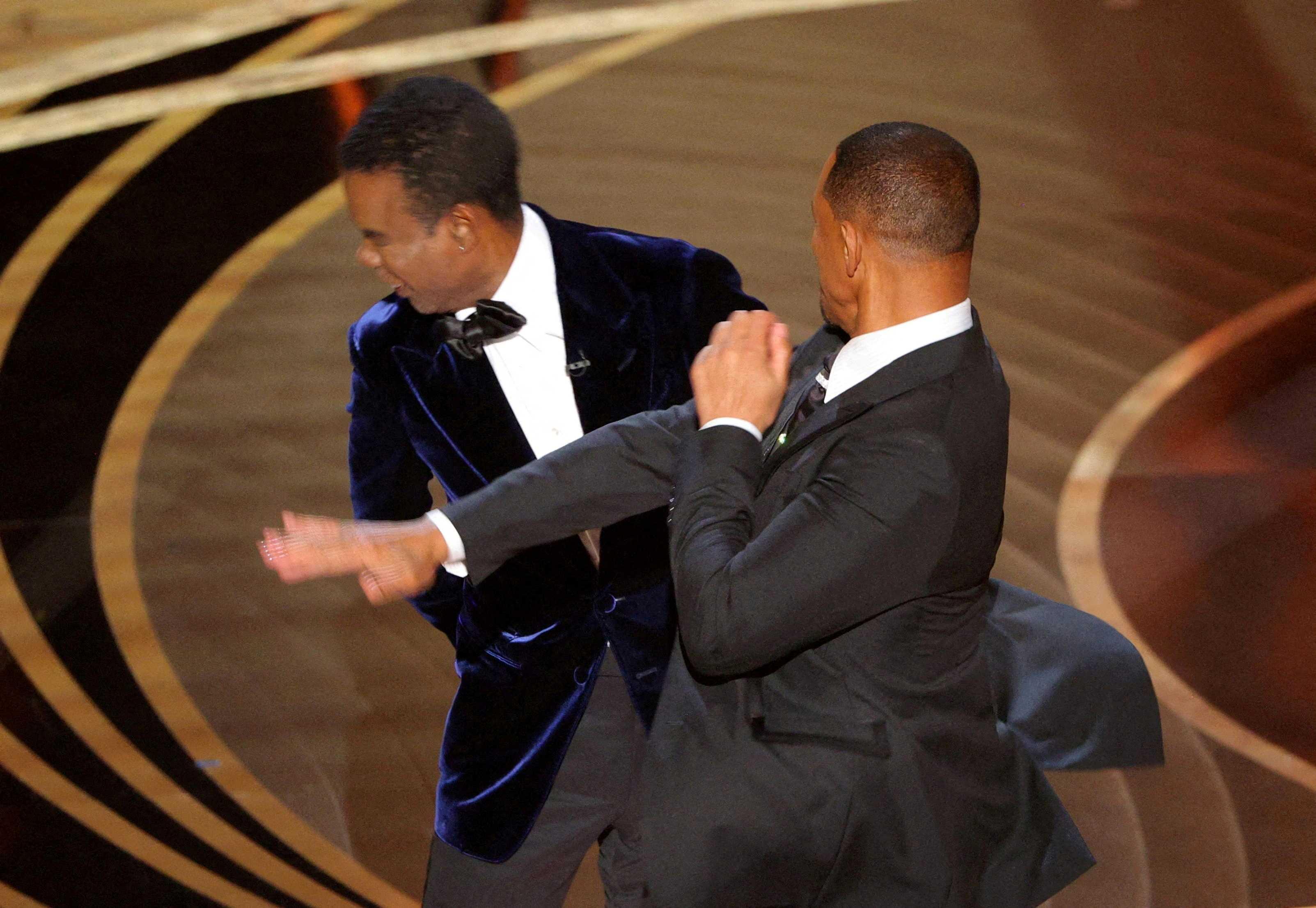 Will Smith hits Chris Rock onstage during the 94th Academy Awards in Hollywood, Los Angeles, California, US, March 27, 2022. Photo: Reuters