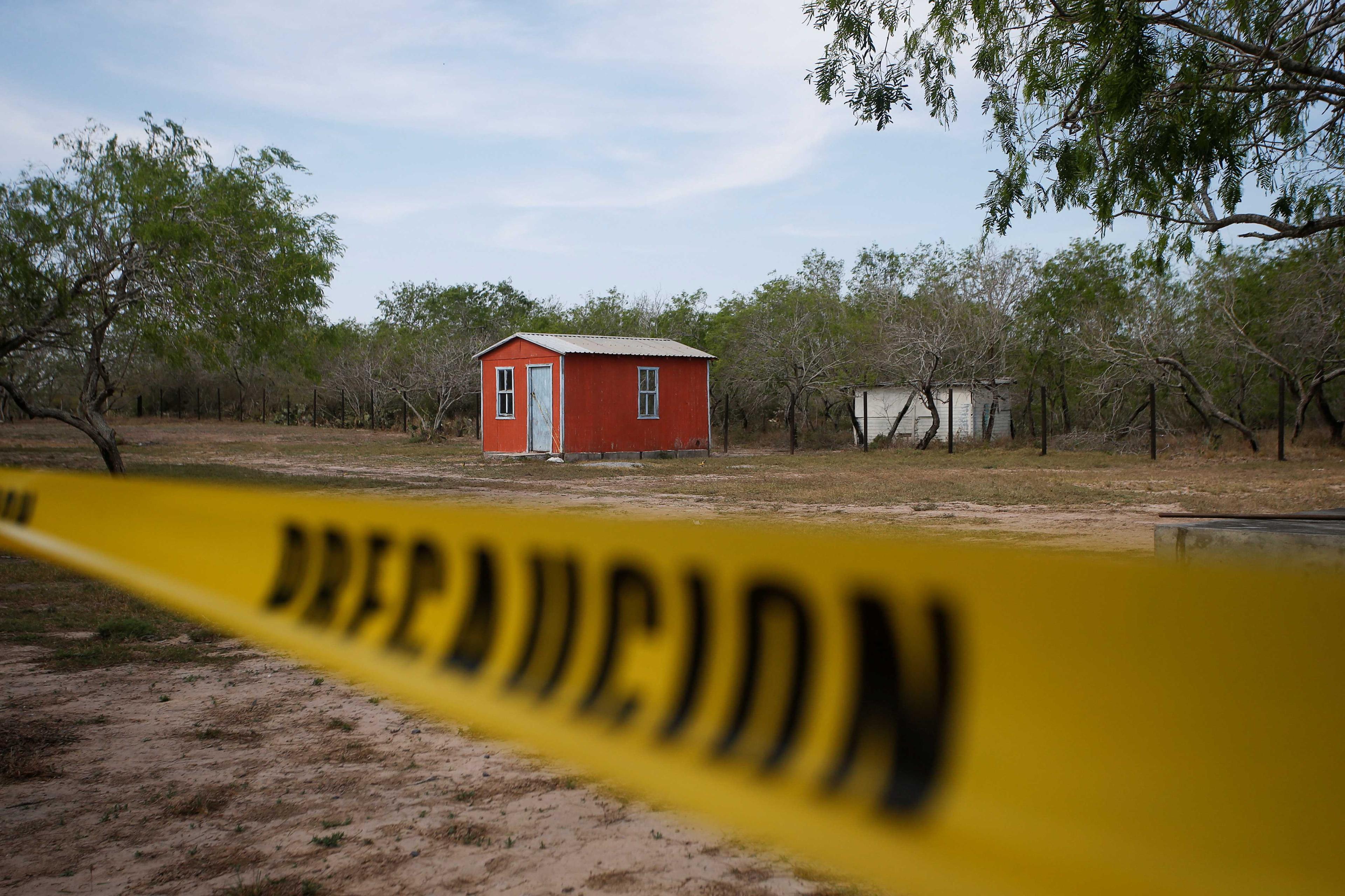 A general view of a storage shed behind a police cordon, at the scene where authorities found the bodies of two of four Americans kidnapped by gunmen, in Matamoros, Mexico March 7. Photo: Reuters
