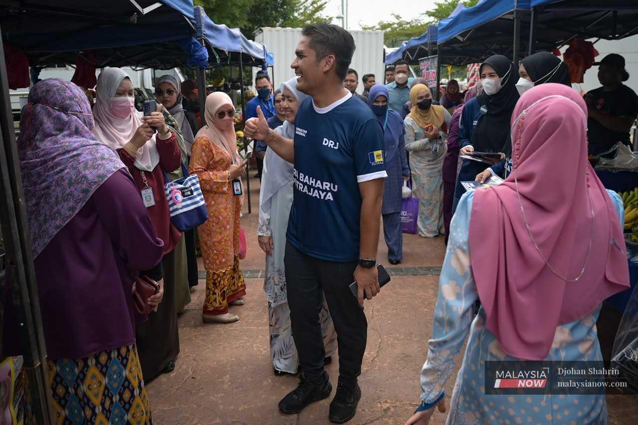 Bersatu's Radzi Jidin on the campaign trail in Putrajaya at the 15th general election last year.