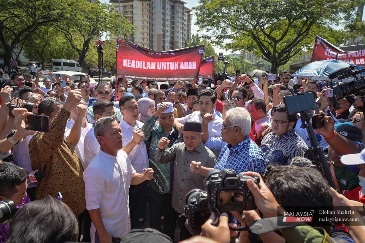 Perikatan Nasional leaders and supporters outside the Malaysian Anti-Corruption Commission headquarters in Putrajaya, March 9. 