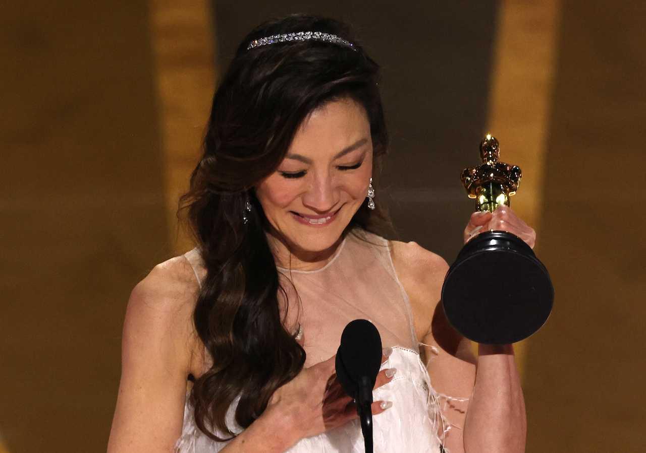 Michelle Yeoh accepts the Oscar for Best Actress for 'Everything Everywhere All at Once' during the Oscars show at the 95th Academy Awards in Hollywood, Los Angeles, California, March 12. Photo: Reuters