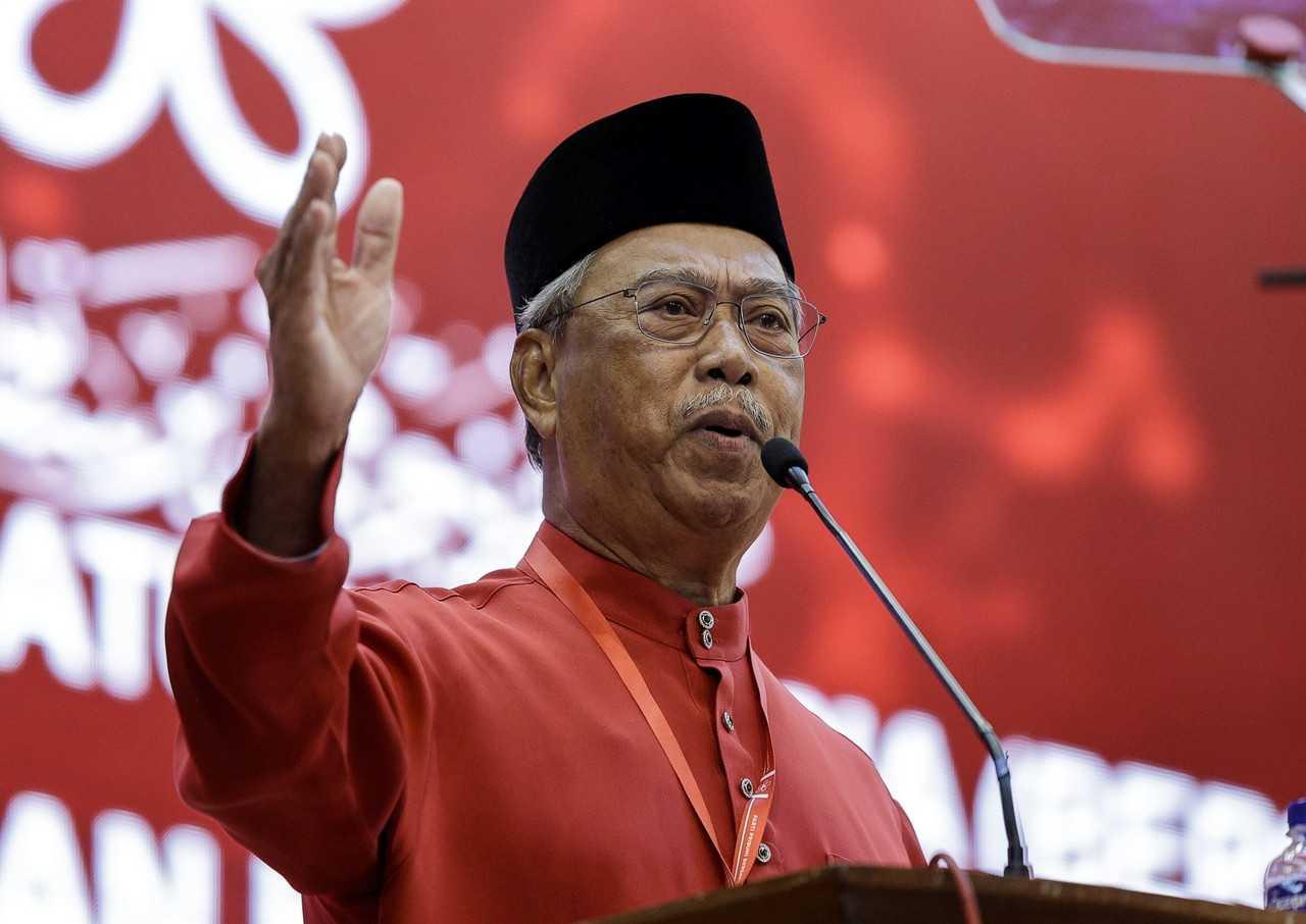 Presiden Bersatu Muhyiddin Yassin berucap pada perhimpunan agung tahunan ke-5 parti itu di Kuala Lumpur, 12 Mac. Gambar: Bernama
