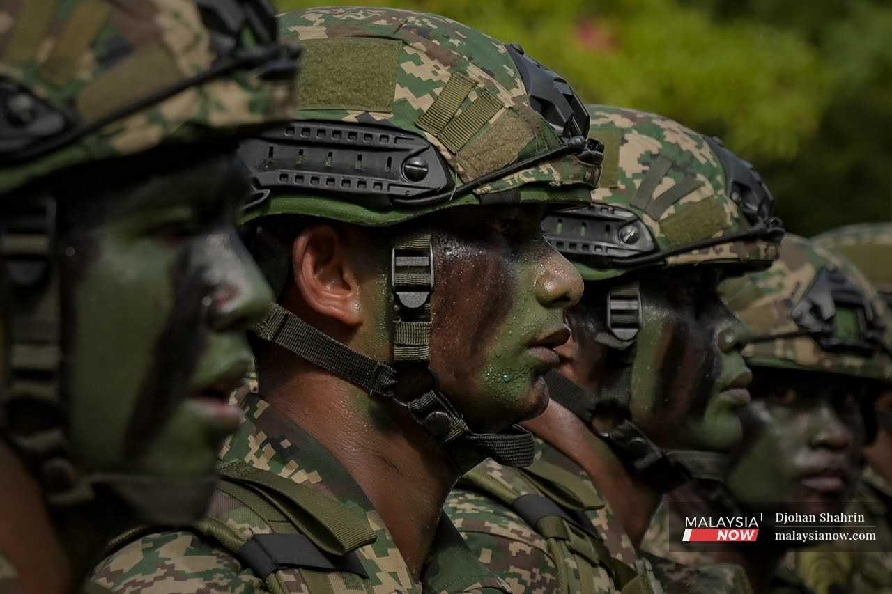 Armed forces personnel participate in the Merdeka parade at Dataran Merdeka, Kuala Lumpur, Aug 31, 2022. 
