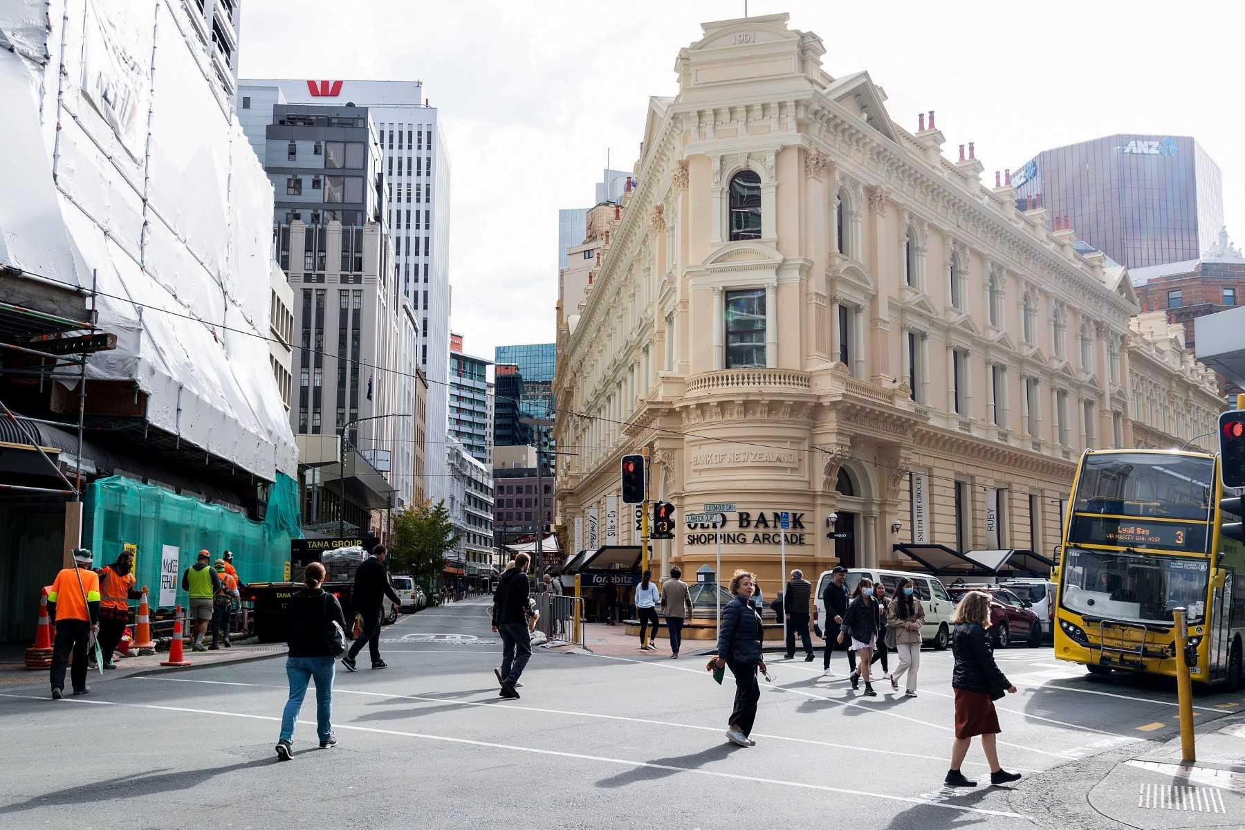 People walk on a street in Wellington on May 14, 2020. Photo AFP
