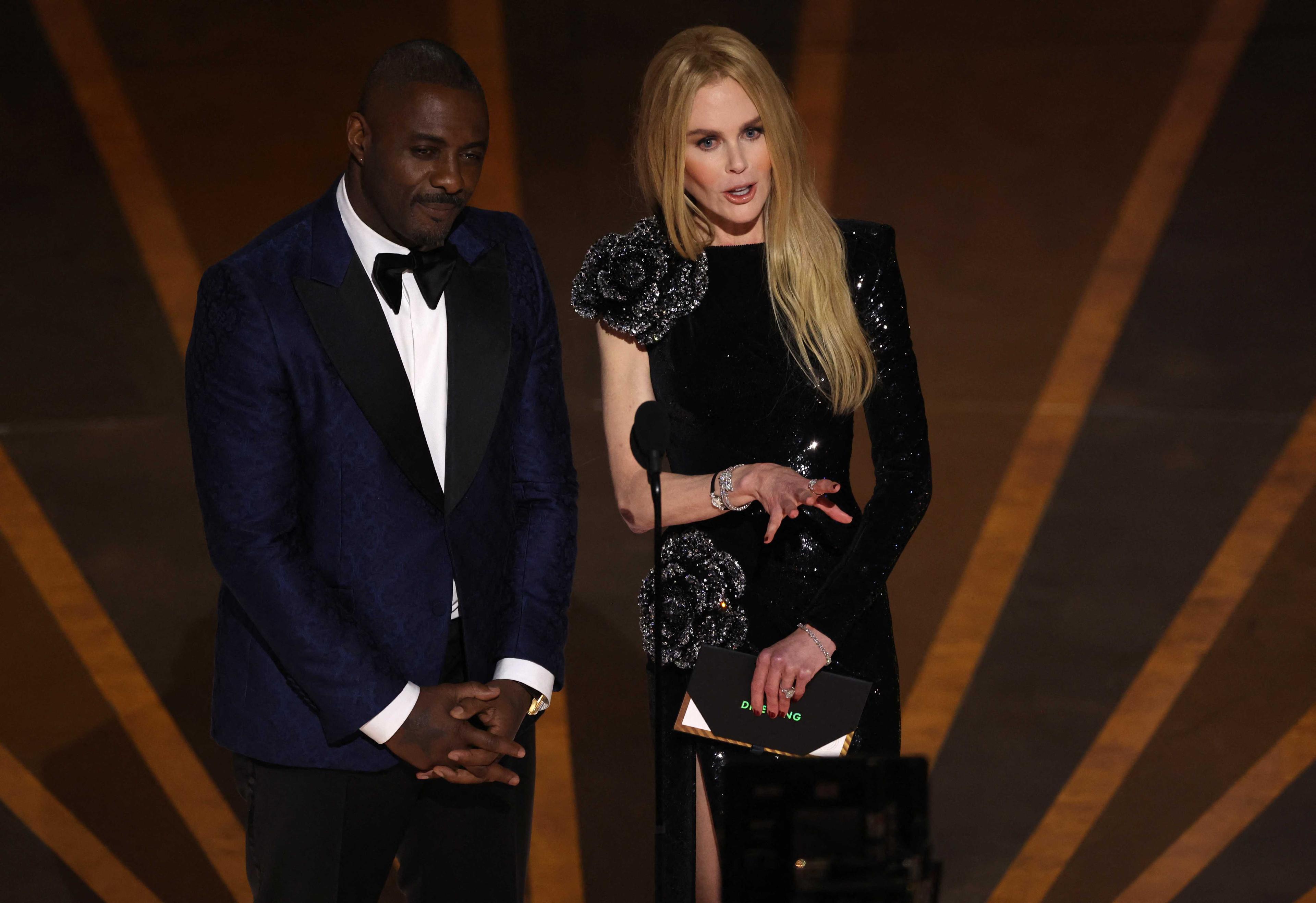 Idris Elba and Nicole Kidman take the stage to present an award during the Oscars show at the 95th Academy Awards in Hollywood, Los Angeles, California, US, March 12. Photo: Reuters