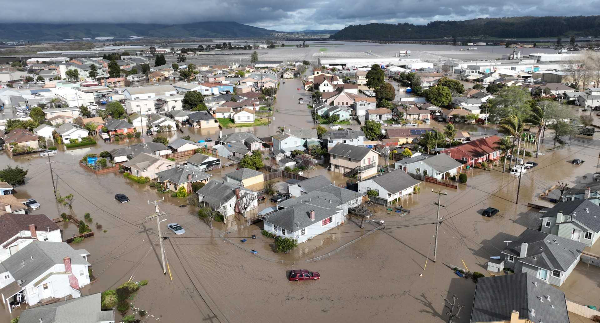 This aerial photograph shows vehicles and homes engulfed by floodwaters in Pajaro, California, March 11. Photo: AFP 