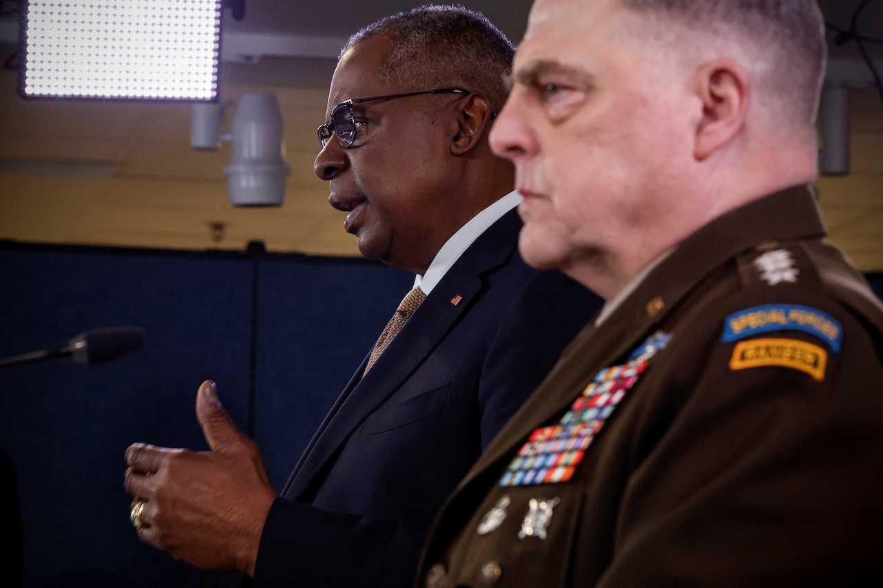 US Defense Secretary Lloyd Austin and US Chairman of the Joint Chiefs of Staff Mark Milley hold a news conference following a virtual Ukraine Defense Contact Group meeting, at the Pentagon in Washington, March 15. Photo: Reuters