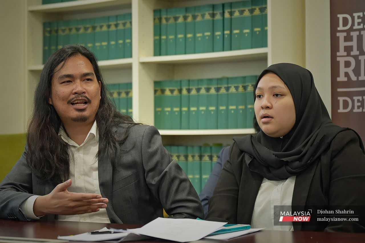 Lawyers for Liberty director Zaid Malek (left) speaks at a press conference in Petaling Jaya, March 16.
