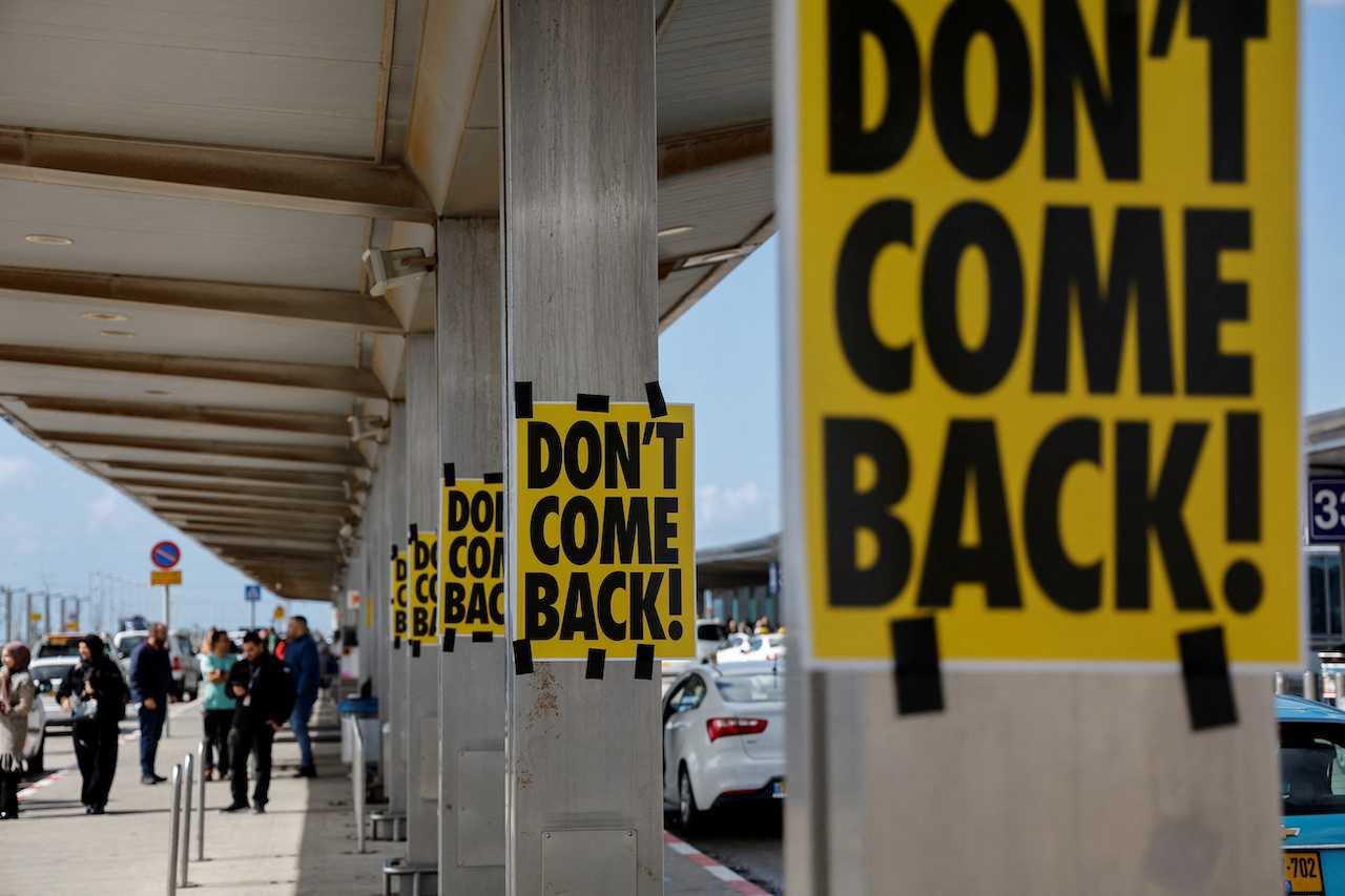 Protesters demonstrate at Ben Gurion International Airport in an attempt to disrupt the departure of Israeli Prime Minister Benjamin Netanyahu to Berlin for a state visit, as his nationalist coalition government presses on with its contentious judicial overhaul, in Lod, Israel, March 15. Photo: Reuters