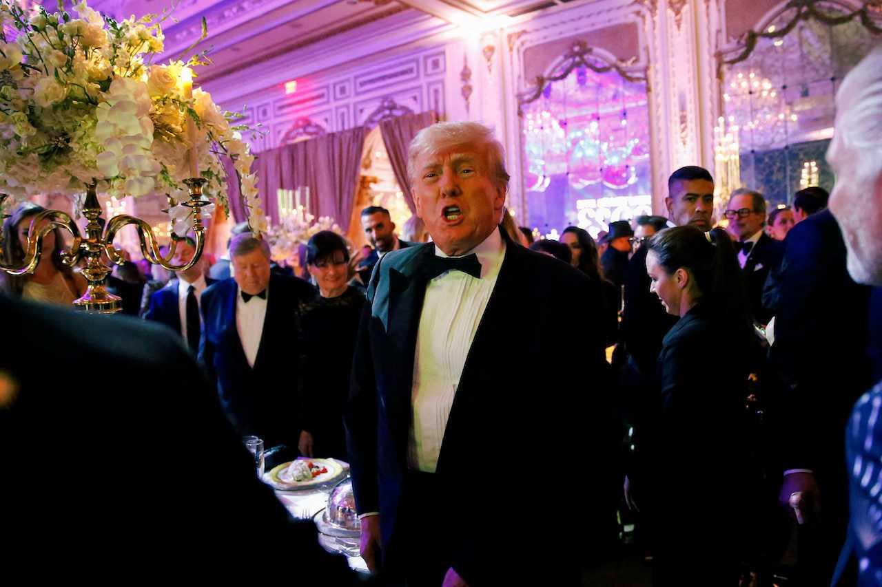 Former US president Donald Trump hosts a New Year's Eve party at his Mar-a-Lago resort in Palm Beach, Florida, Dec 31, 2022. Photo: Reuters